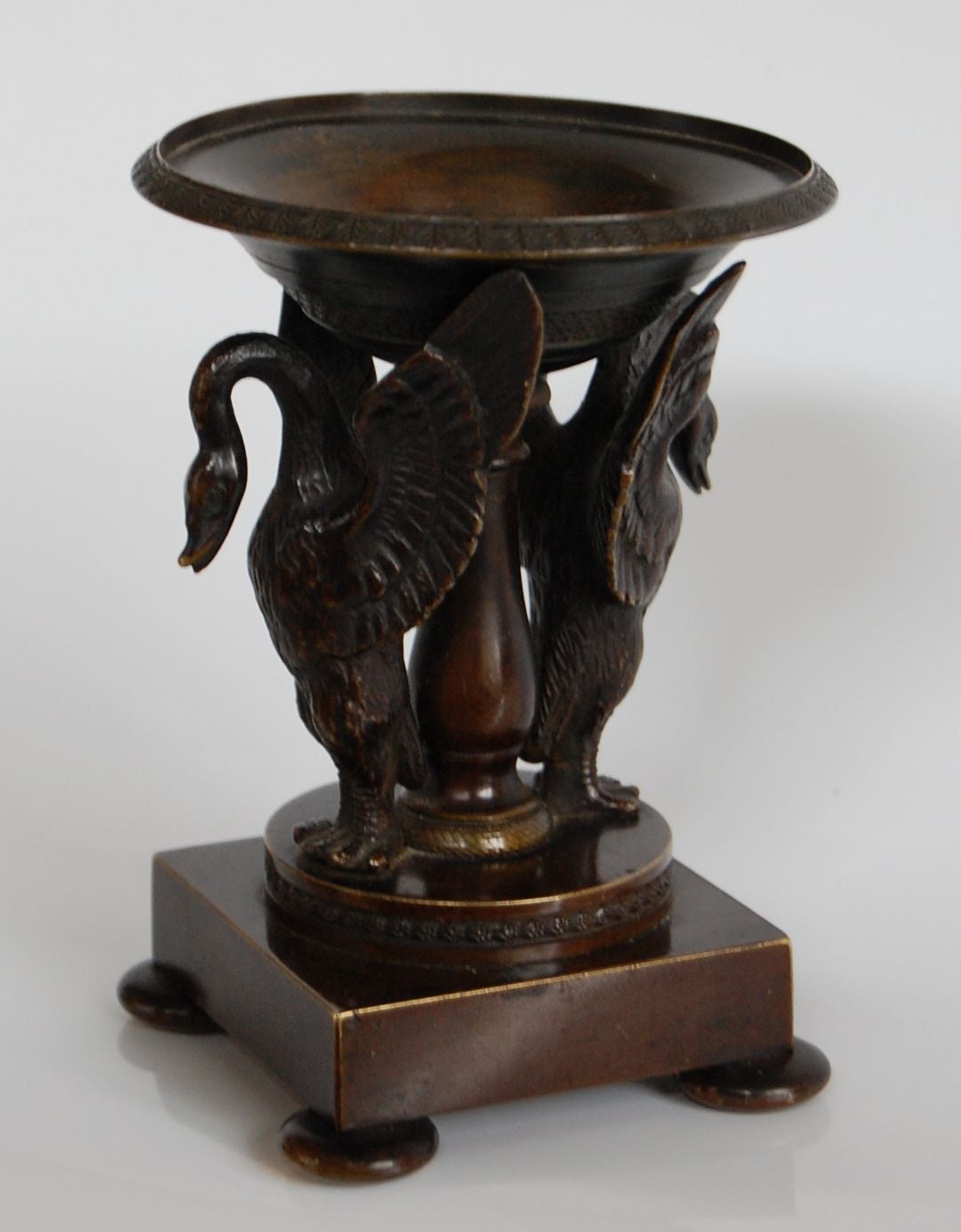 Bronze incense burner supported by two Heron on a raised square base with bun feet. Excellent condition.