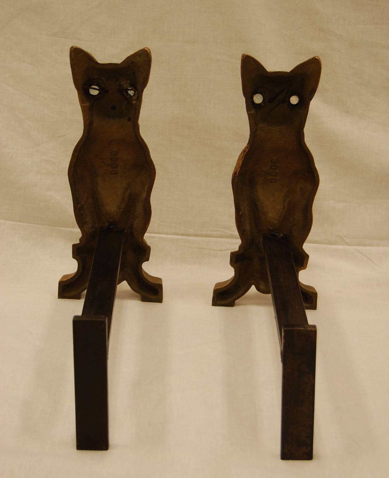 Cast Pair of Solid Brass Dog Andirons with Clear Glass Eyes