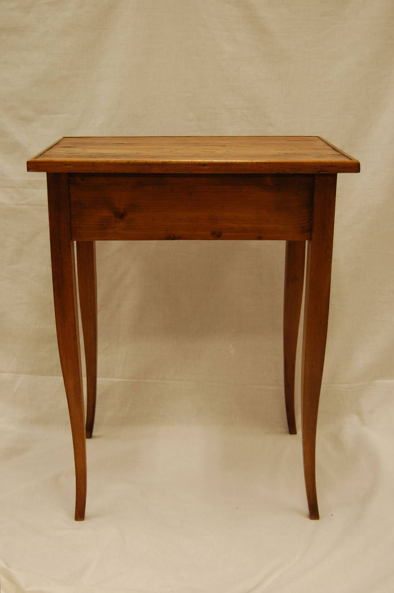 Pine or Ash table with glass knob in excellent condition. This table is said to be from Canada and is French in style.