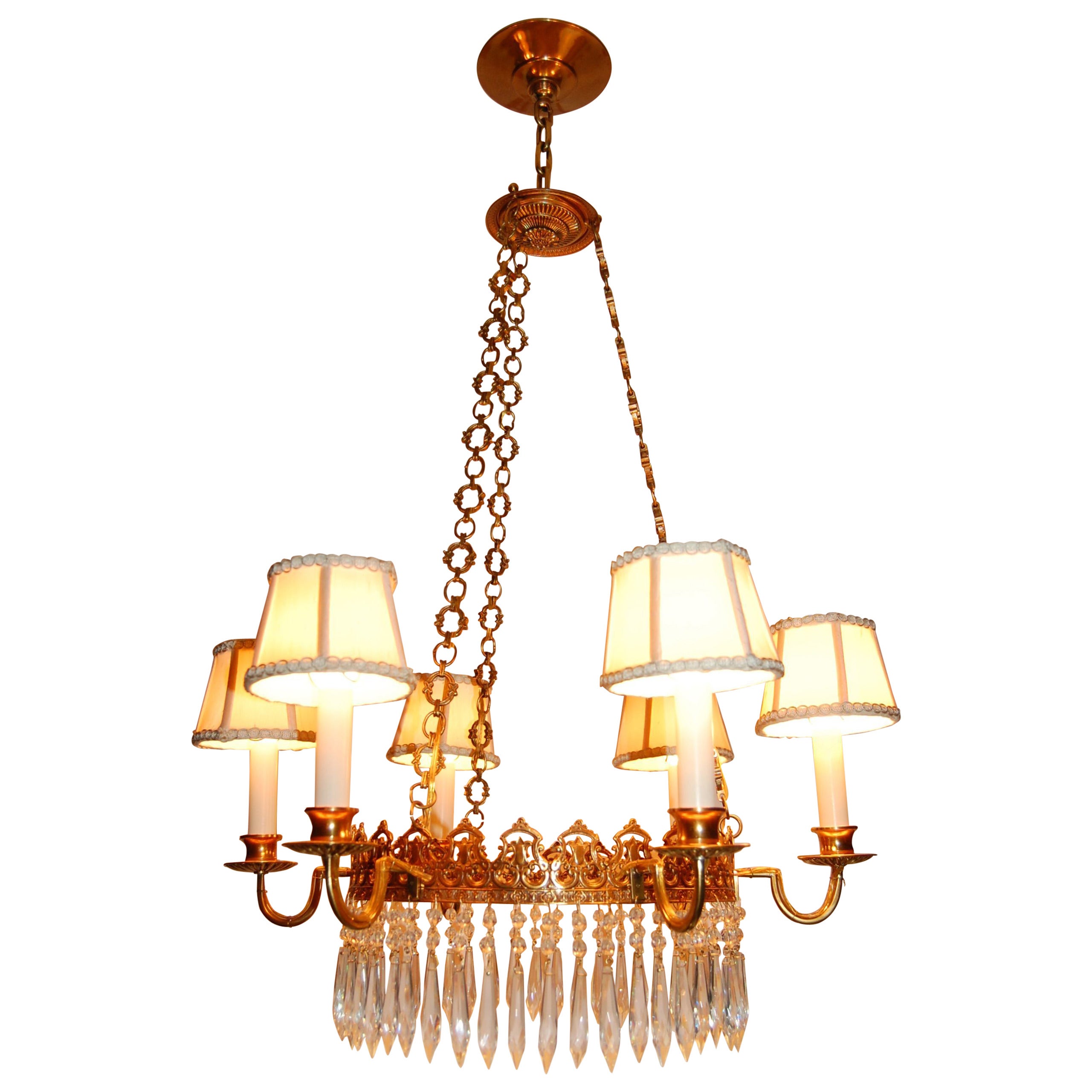 Regency Style Brass and Crystal Six-Light Chandelier, circa 1920 For Sale