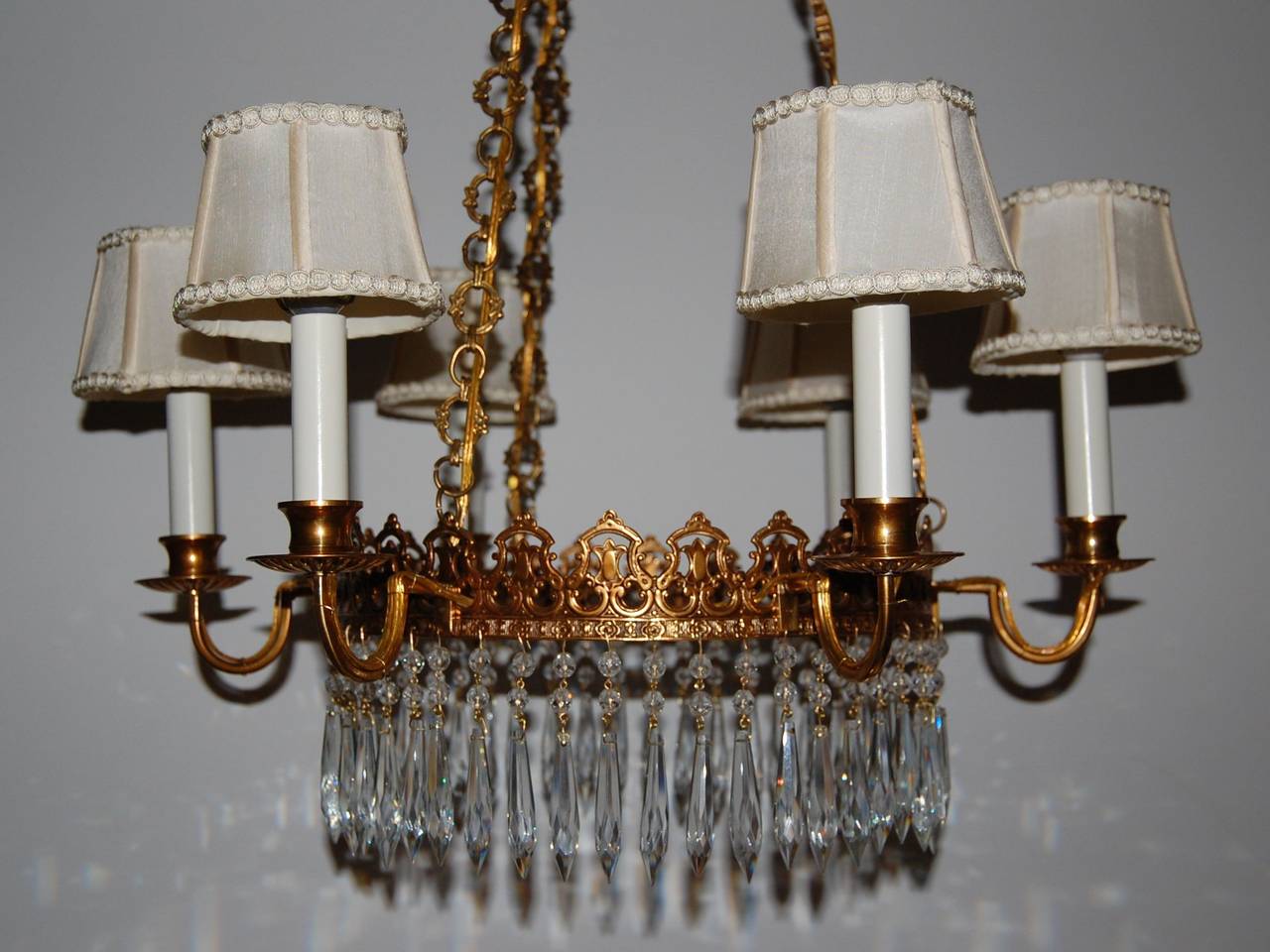 Pretty brass fixture with crystal drops recently cleaned and rewired. (shades not included).