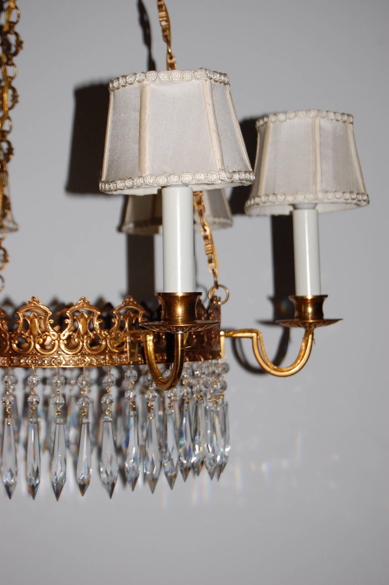 Early 20th Century Regency Style Brass and Crystal Six-Light Chandelier, circa 1920 For Sale