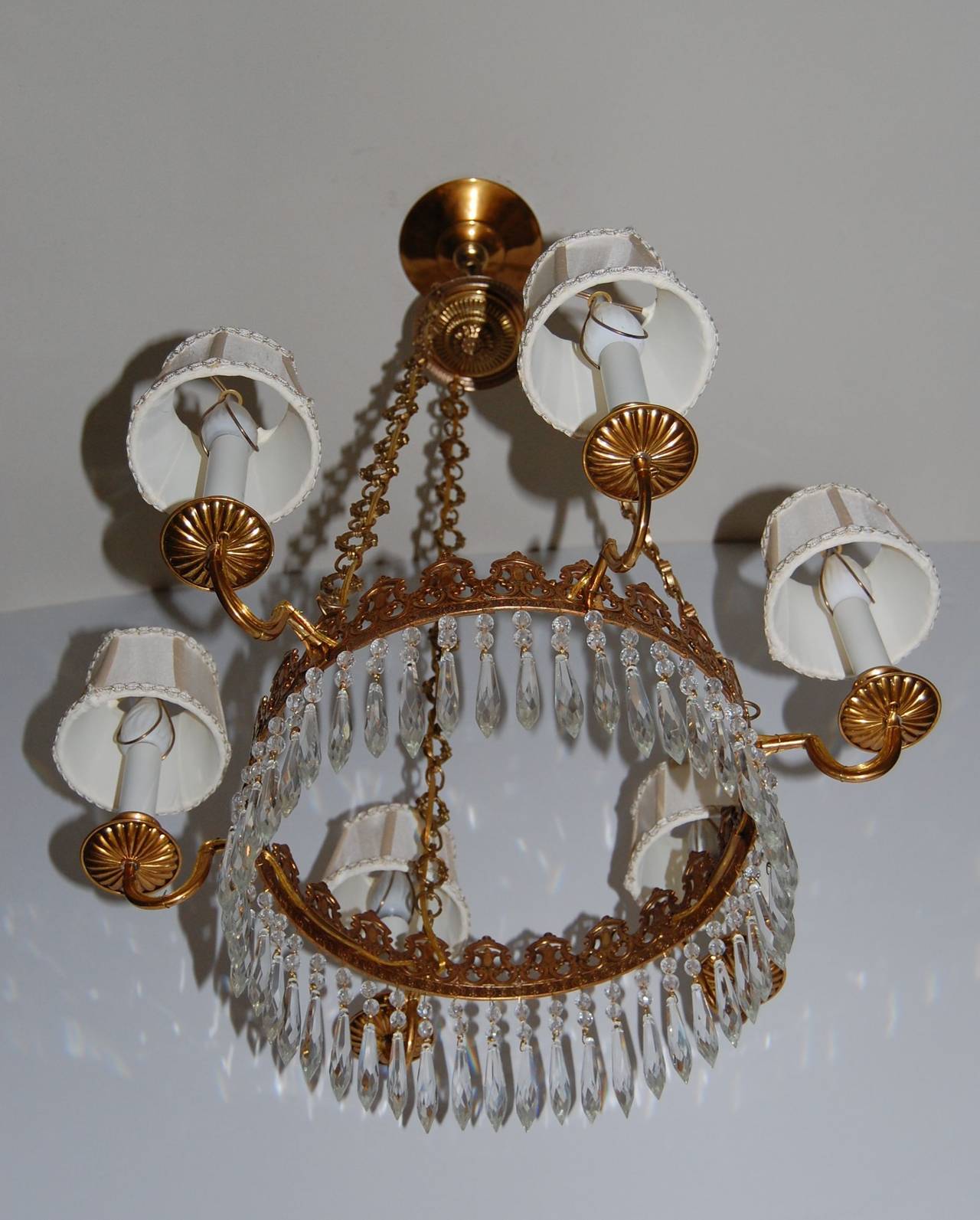 British Regency Style Brass and Crystal Six-Light Chandelier, circa 1920 For Sale