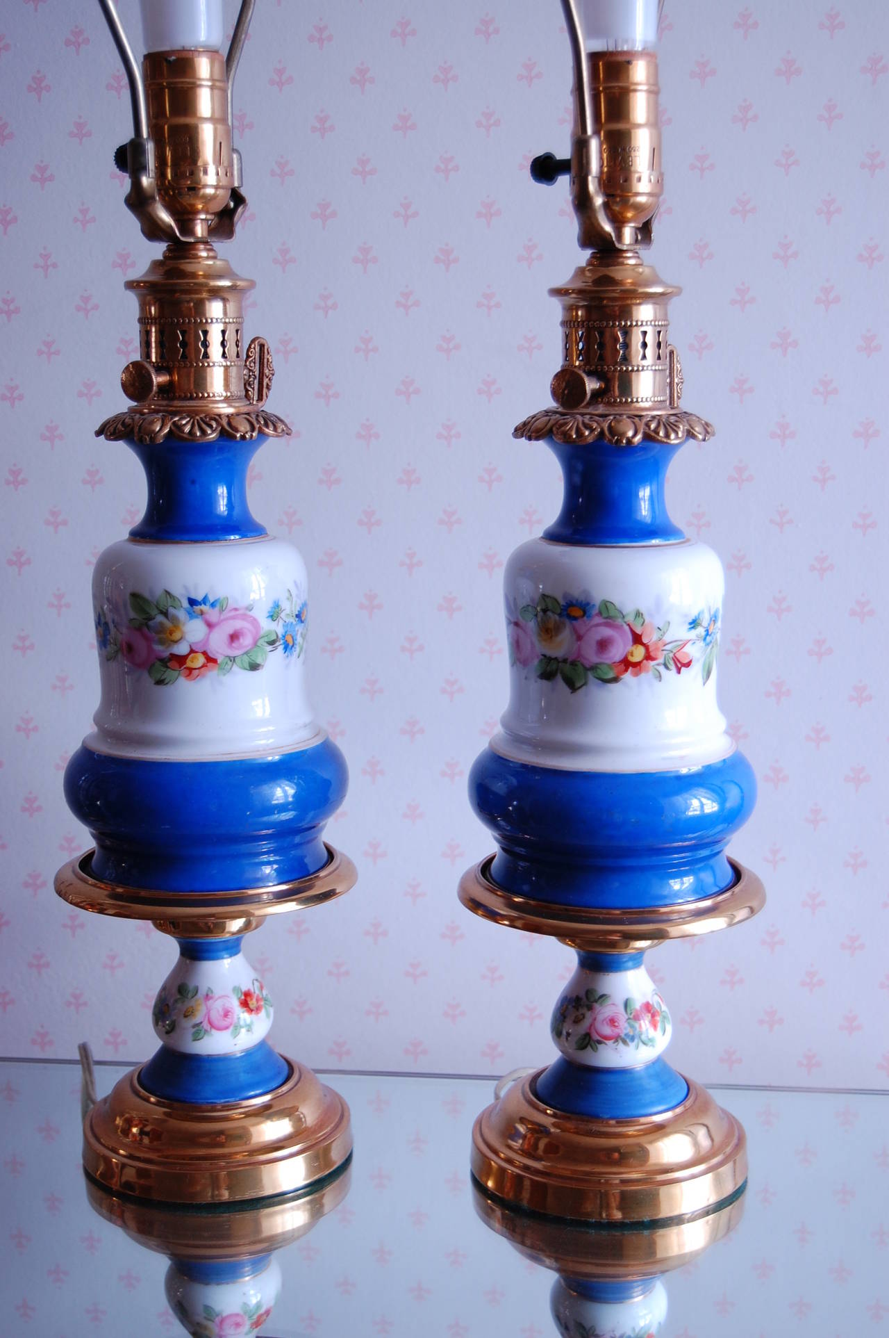 Mid-19th Century Pair of Floral Decorated French Porcelain Oil Lamps, Likely Sevres, circa 1850 For Sale