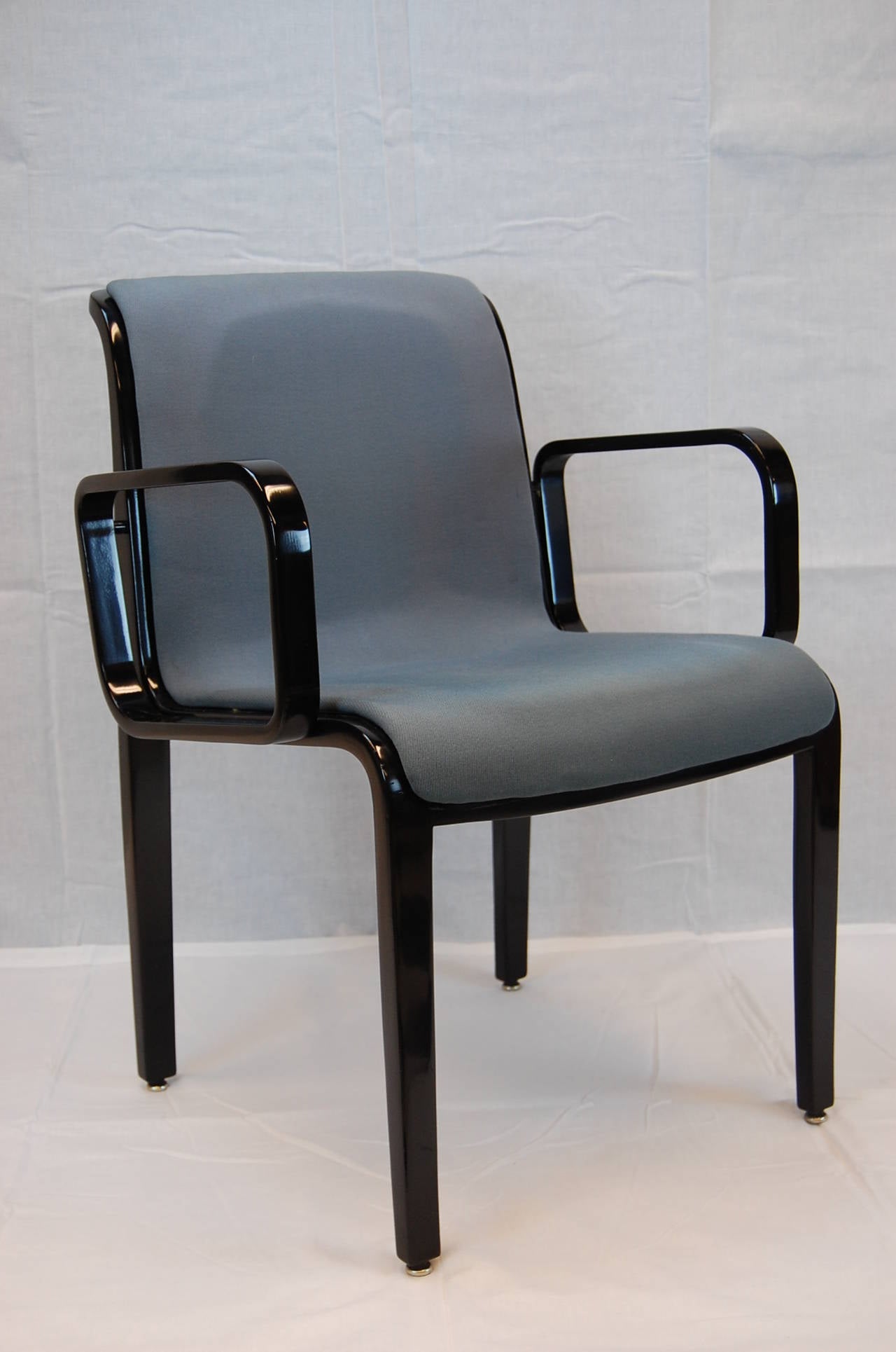 Black lacquered bentwood armchair by Bill Stephens for Knoll, still upholstered in its original blue-gray fabric. Original tag is stamped either 1990 or 1996.