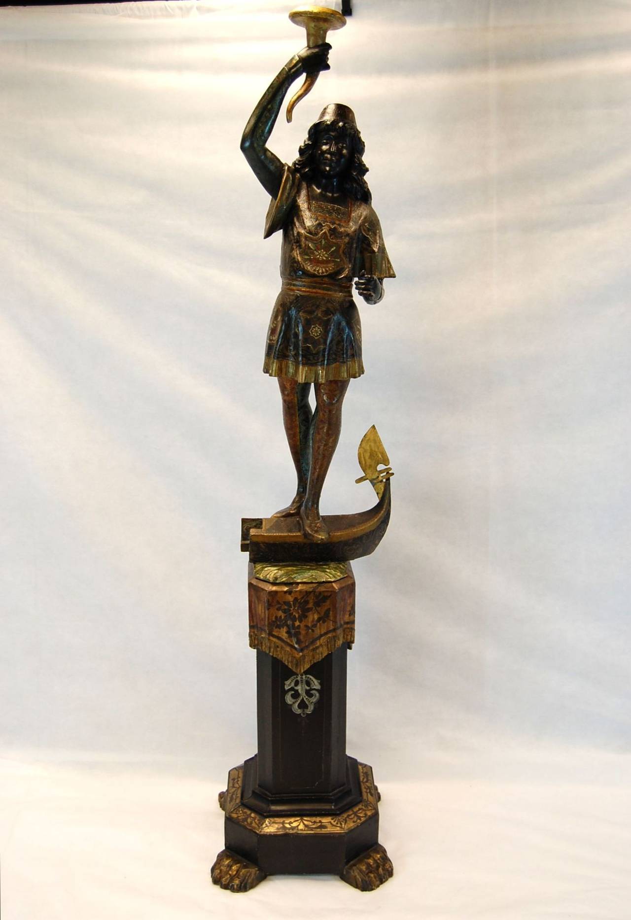 Mid-19th century male figure on gondola with elaborately carved pedestal. Top portion, 43.75