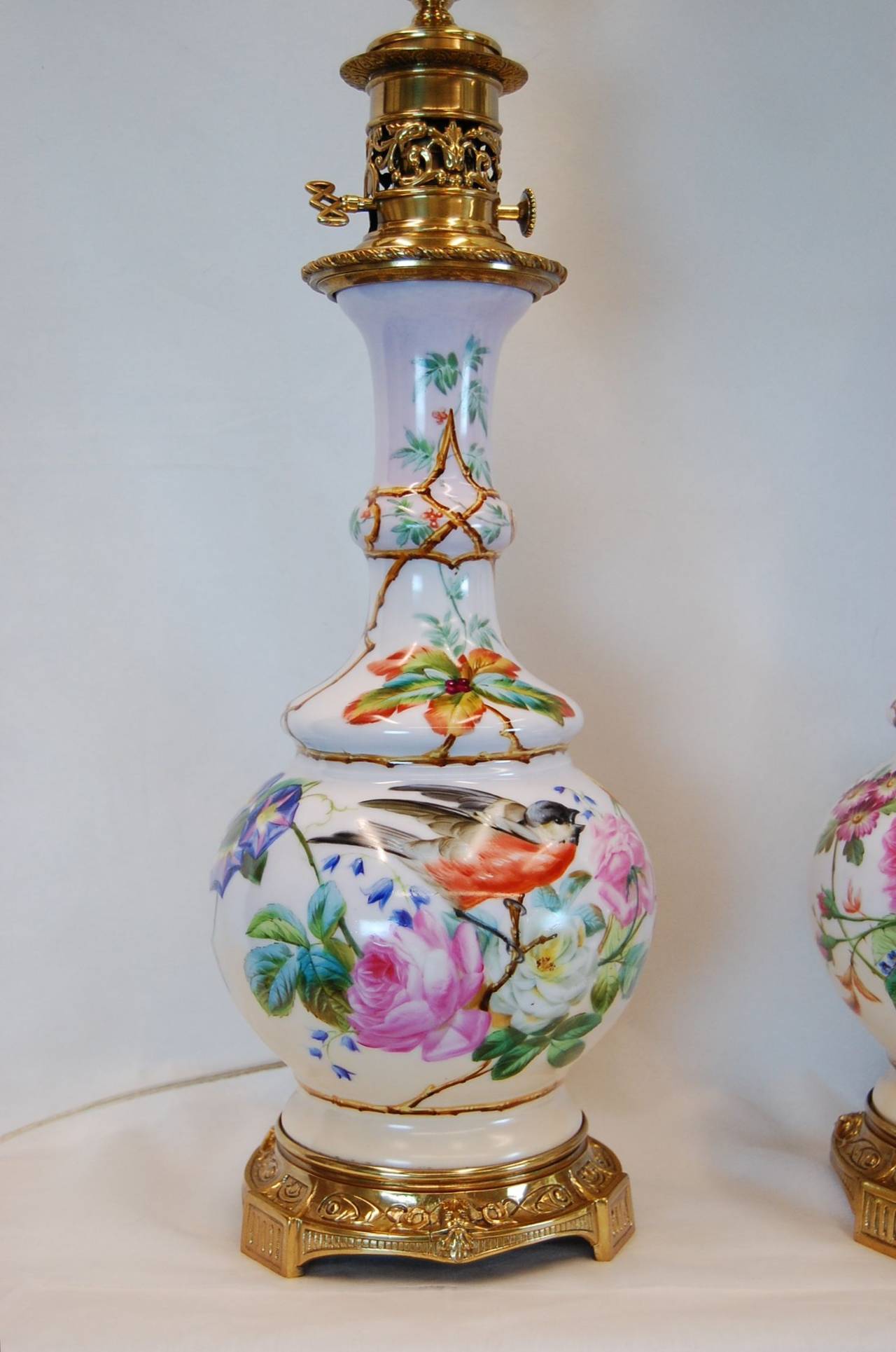 Pair Hand Painted English Porcelain Oil Lamps Decorated w/ Birds & Flowers In Excellent Condition In Pittsburgh, PA