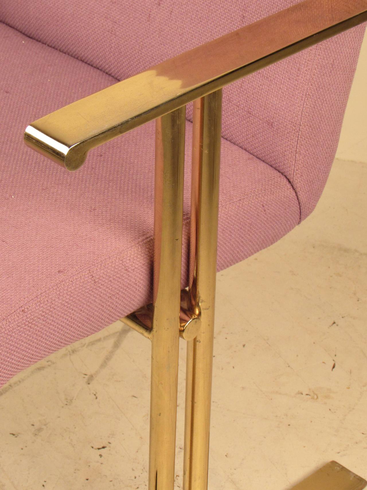 Stunning brass armchair or desk chair with sled base made by Directional. We have 3 of these available.

Brass is in great vintage condition with only minor wear and are in above average condition for age, use and material. The nubby lavender wool