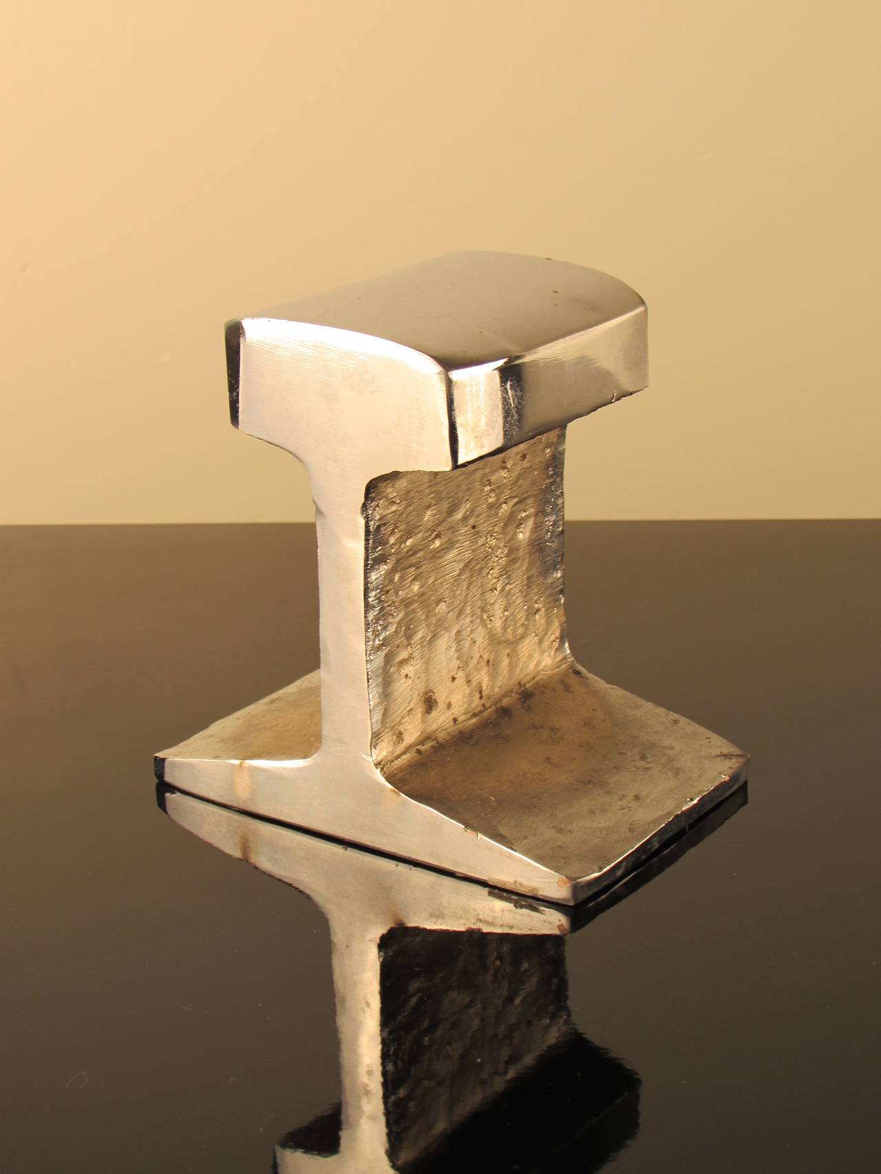 Industrial meets glam! Cast metal railroad tie bookends plated in nickel for a sparkly chrome finish! Wonderful quality.

Excellent condition with minor wear consistent with age and use.