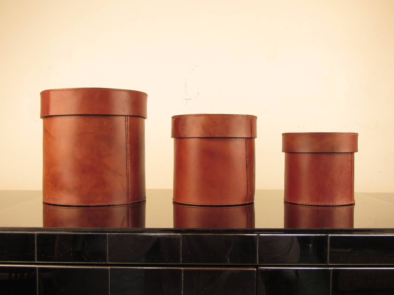 International Style Handsome Trio of Buttery Leather Lidded Vessels