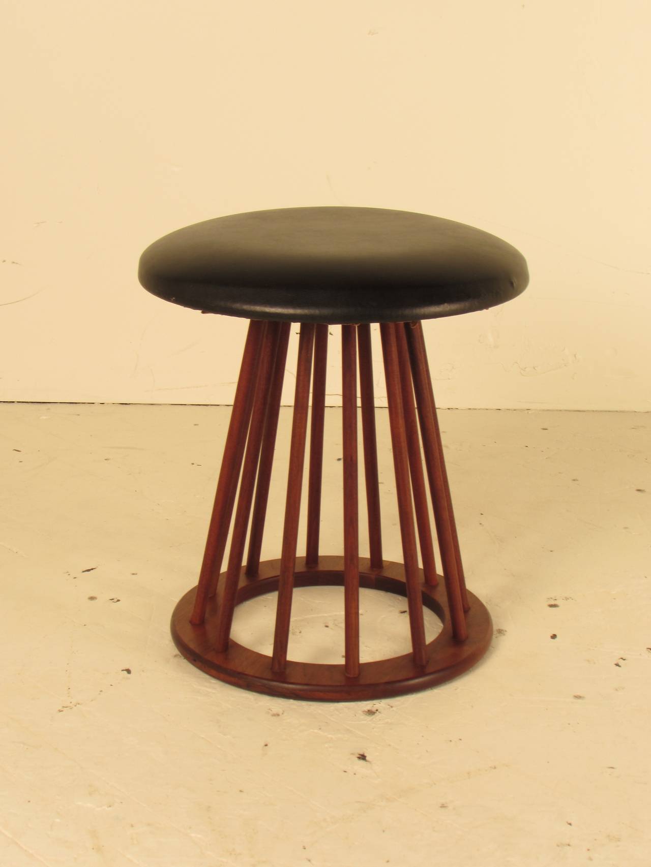 Danish Modern Teak Spindle Stool by Arthur Umanoff for Washington Wood Products. The seat is original and in excellent condition. Frame is made of multiple teak spokes which create an open framework that is both simple and elegant. 

Condition: