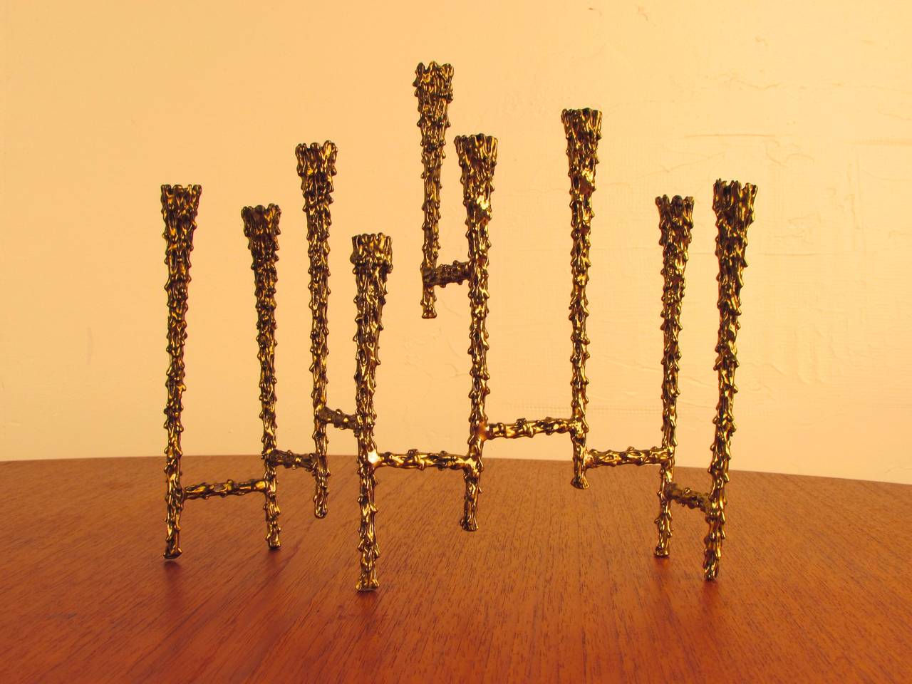 Truly exquisite menorah in the Brutalist style. This piece is made of chased bronze with intricate surface decoration. A spectacular, sculptural piece in excellent condition.