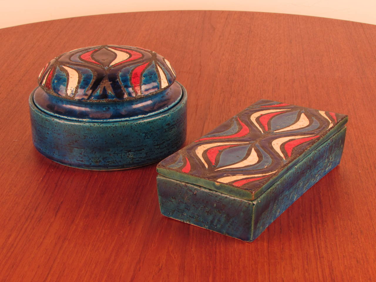 Exceptional design and colors! Utterly gorgeous lidded boxes imported to the US by Rosenthal Netter. These are likely designed by either Bitossi or Londi, but we are unsure. We do know that this is a very, very hard to find design and color way.