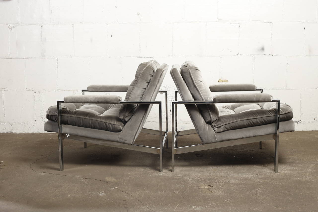 Sleek pair of Milo Baughman lounge chairs in chrome and gray maharam velvet, circa 1970. Manufactured by Thayer Coggin. Condition is excellent. Upholstery is new.

We offer free delivery to NYC and Philadelphia area. Delivery to DC, MD, CT, and MA