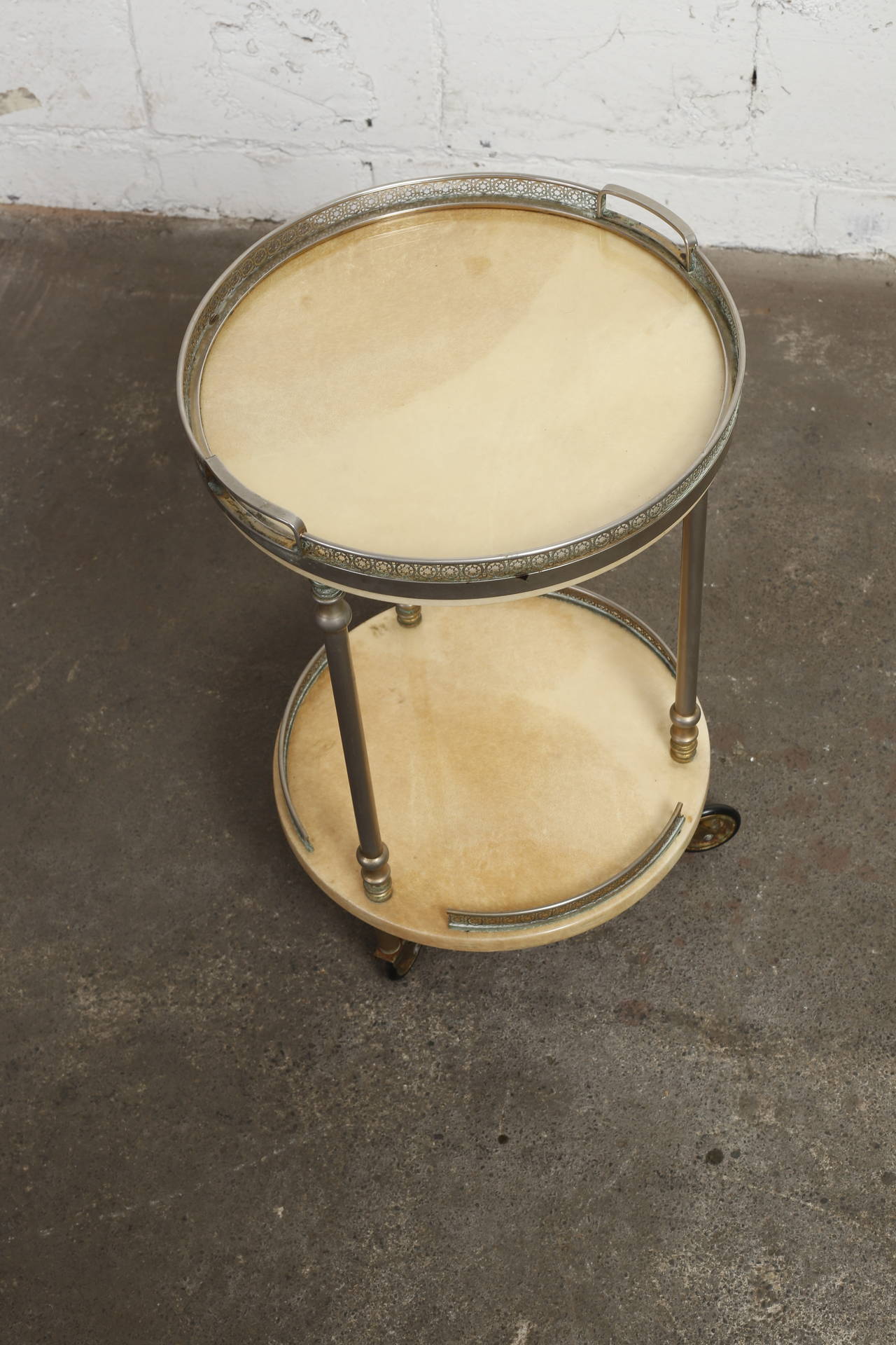 Petite goatskin bar cart with removable serving tray by Aldo Tura, Italy. Condition is excellent.

We offer free delivery to NYC and Philadelphia area. Delivery to DC, MD, CT, and MA are available if schedule permits please message for a