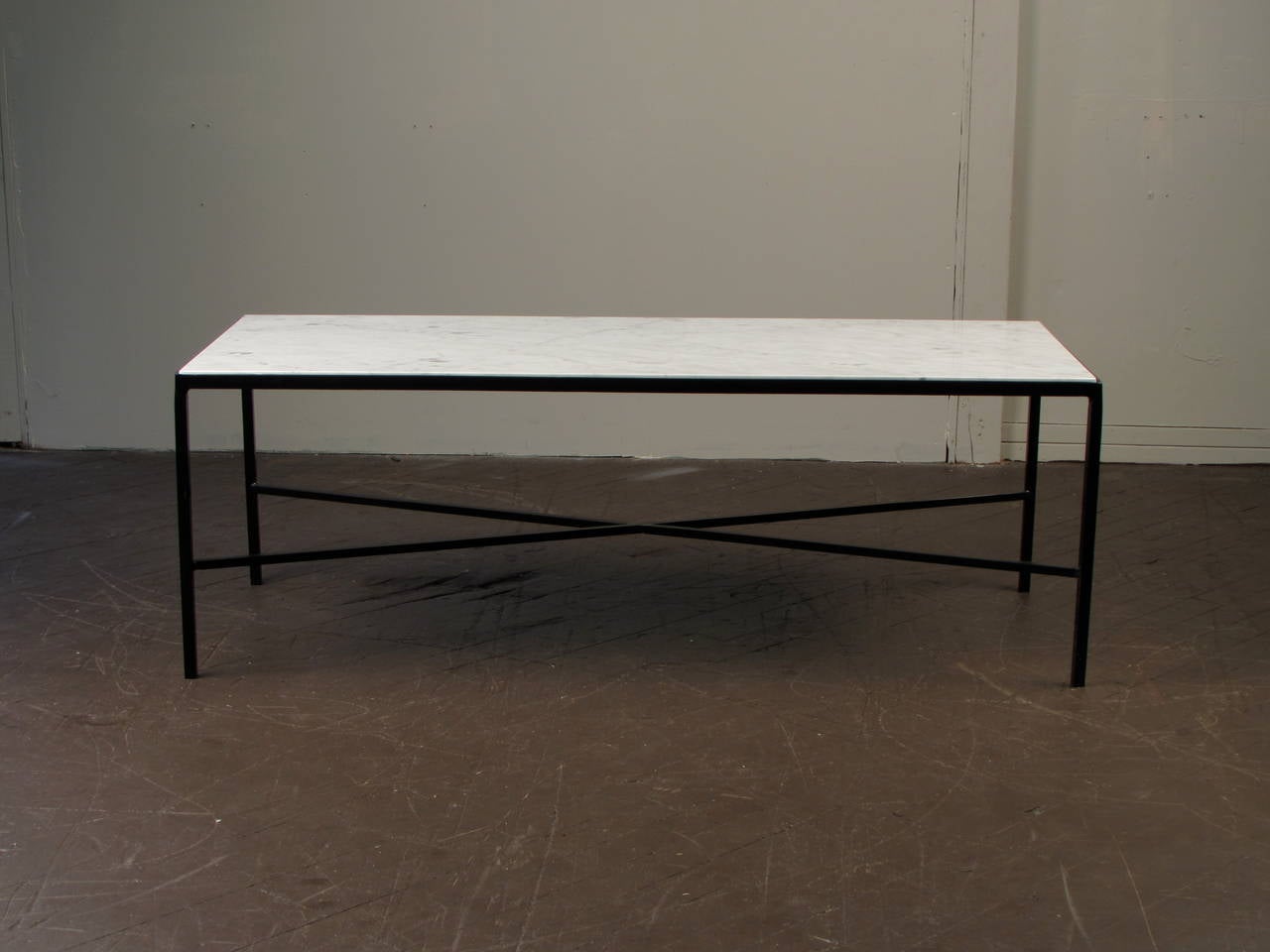Elegant wrought iron and Carrara marble coffee table, stamped 