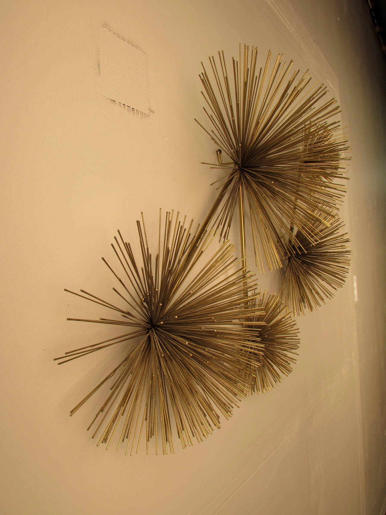American Large Brass Pom Pom Starburst Wall Sculpture by Curtis Jere, USA, 1979