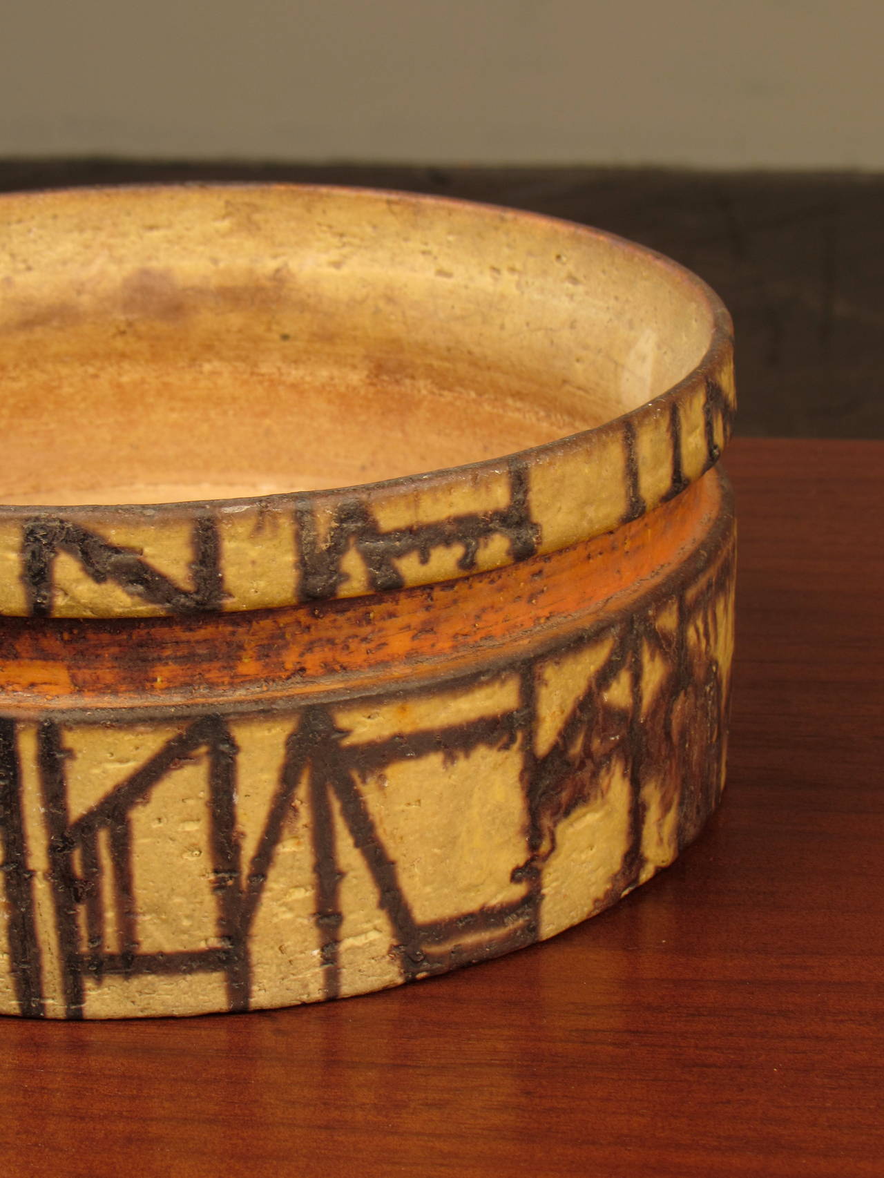 Signed pottery bowl with architectural decoration by Marcello Fantoni, Italy. This piece is in excellent condition with no chips or losses.