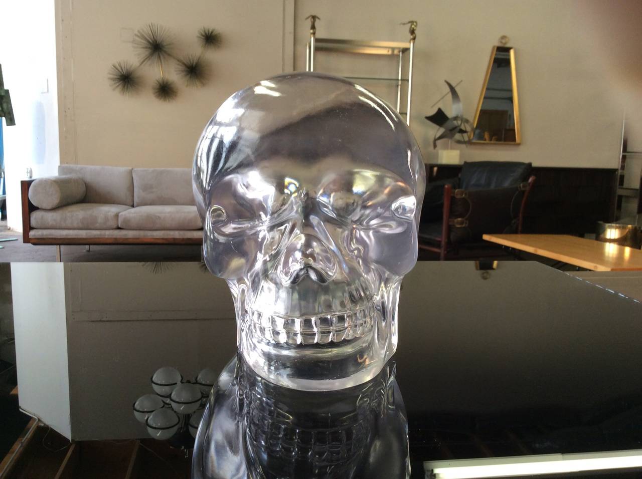 Life-Sized Clear Resin Skull, c1970. Condition is excellent. 

We offer free regular deliveries to NYC and Philadelphia area. Delivery to DC, MD, CT, and MA are available if schedule permits--please message for a location-based delivery