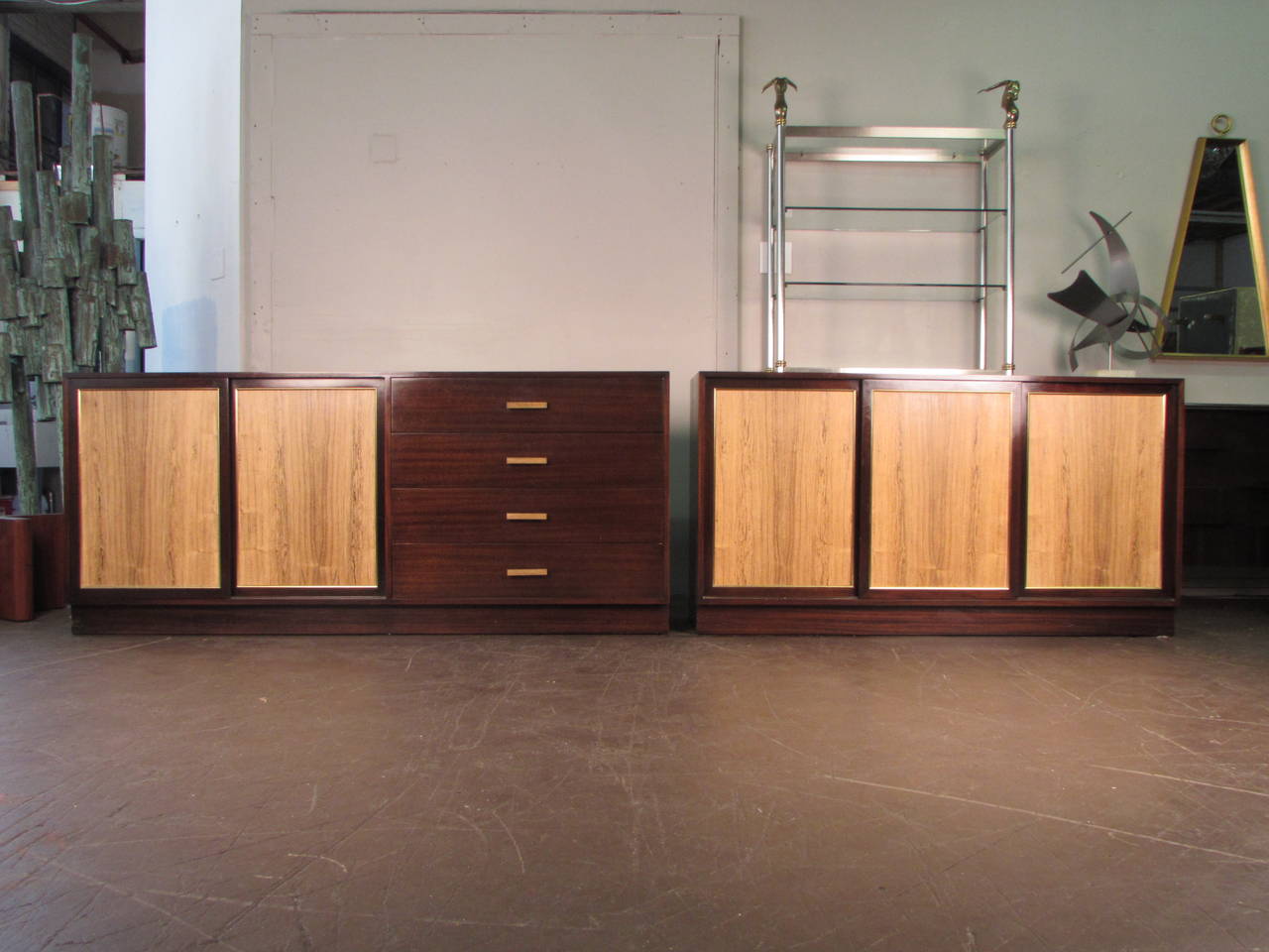 Absolutely gorgeous and rare pair of ribbon mahogany and bleached rosewood dressers or credenzas by Harvey Probber Studio, 1965. The handles are brass with a bleached rosewood detail. These chests were custom ordered by and built for the original