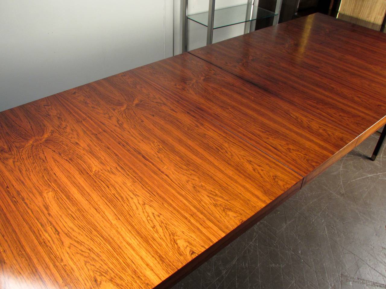 Stunning rosewood dining table with brass stretchers by Harvey Probber Studio, 1965. This table is by far the best quality dining table we have had. Deceivingly heavy. Rosewood grain is absolutely stunning and immaculate. Brass is in excellent
