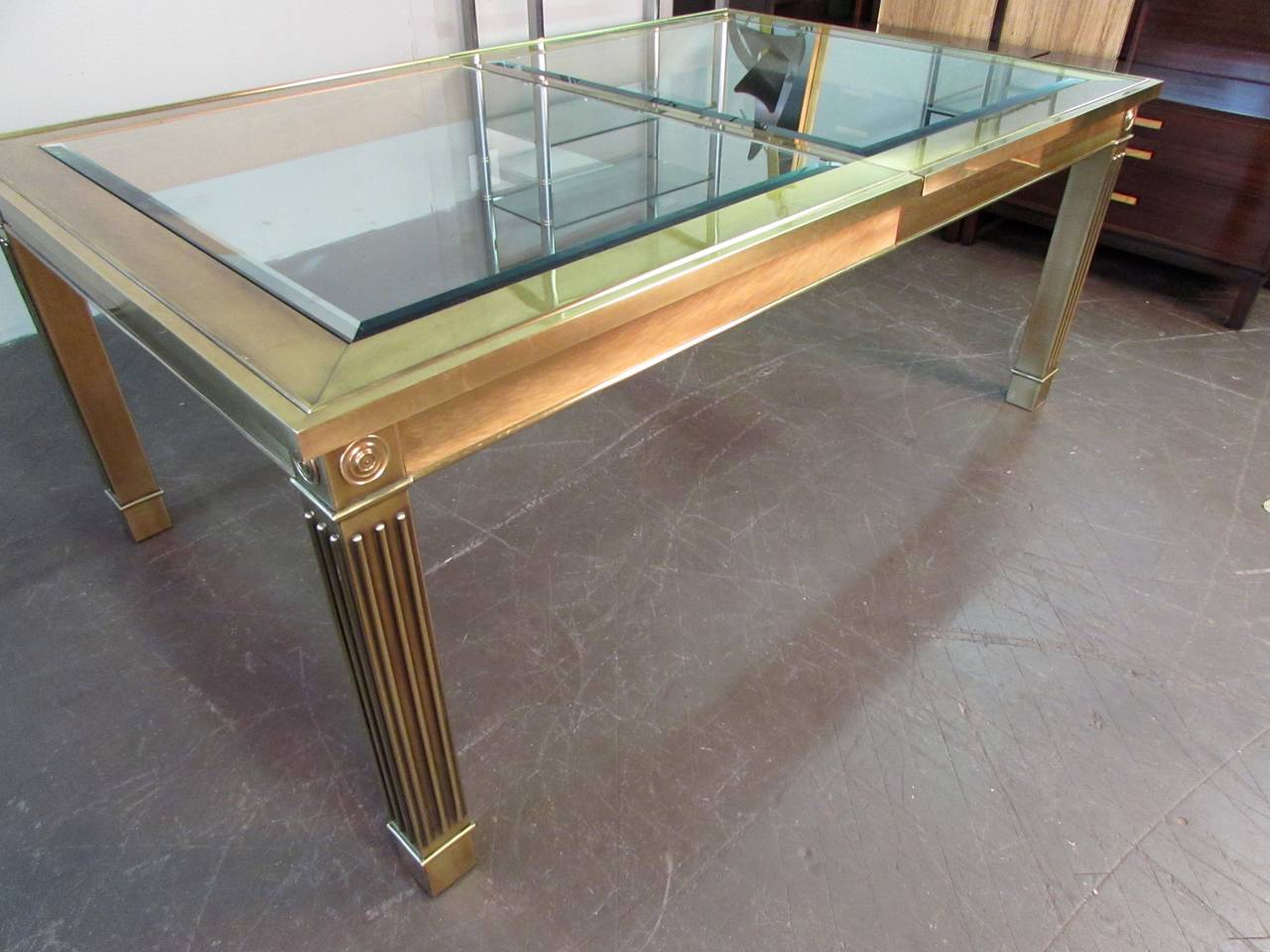 Hollywood Regency Striking Brass and Glass Dining Table with Leaf by Mastercraft, 1970s
