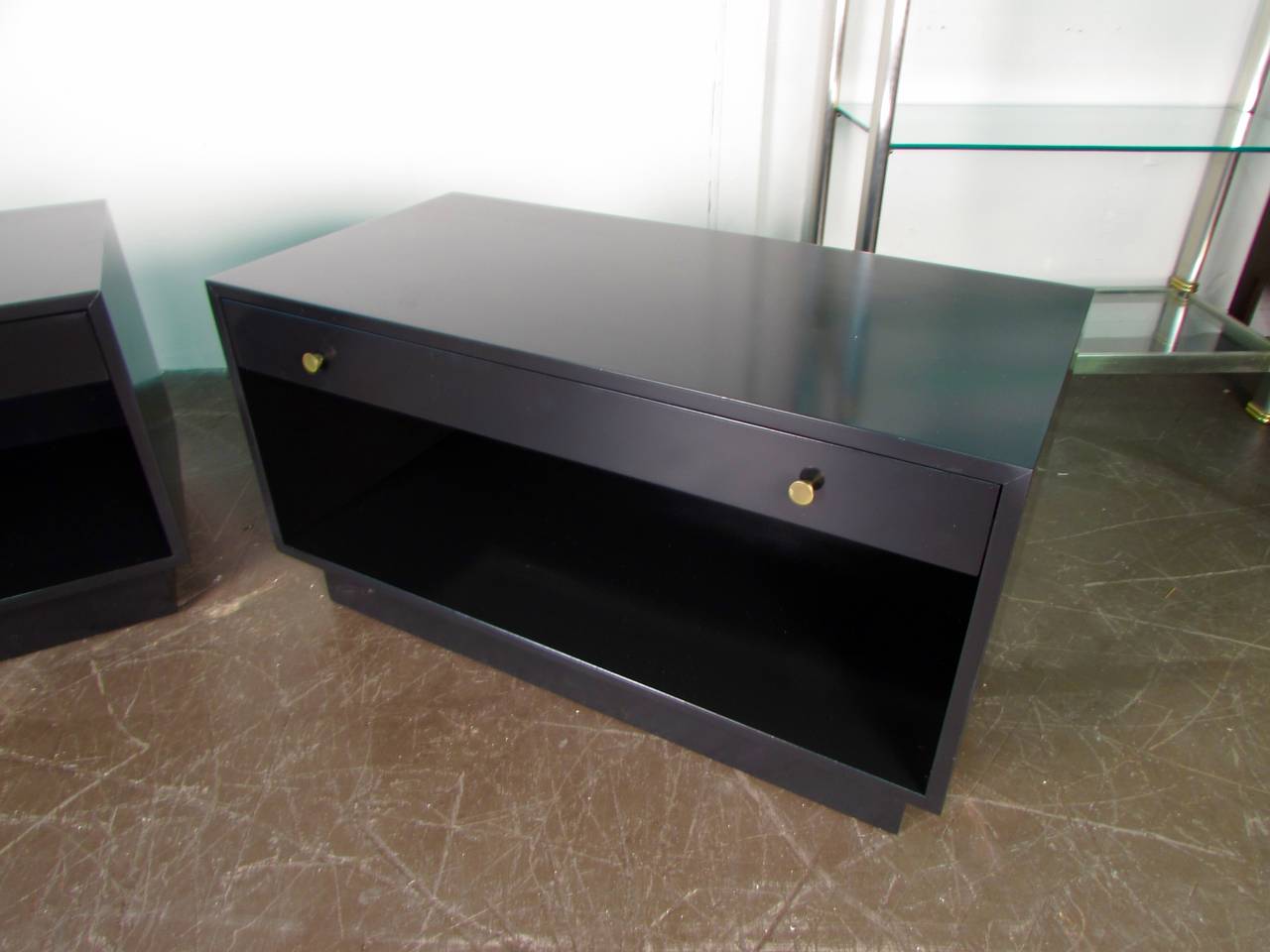 Handsome Pair of Lacquered End Tables or Night Stand by Harvey Probber Studio, 1965. Turned brass pulls. Newly refinished. These pieces were in use by the original owner as night stands. 

Clearance in bottom storage is 10.5