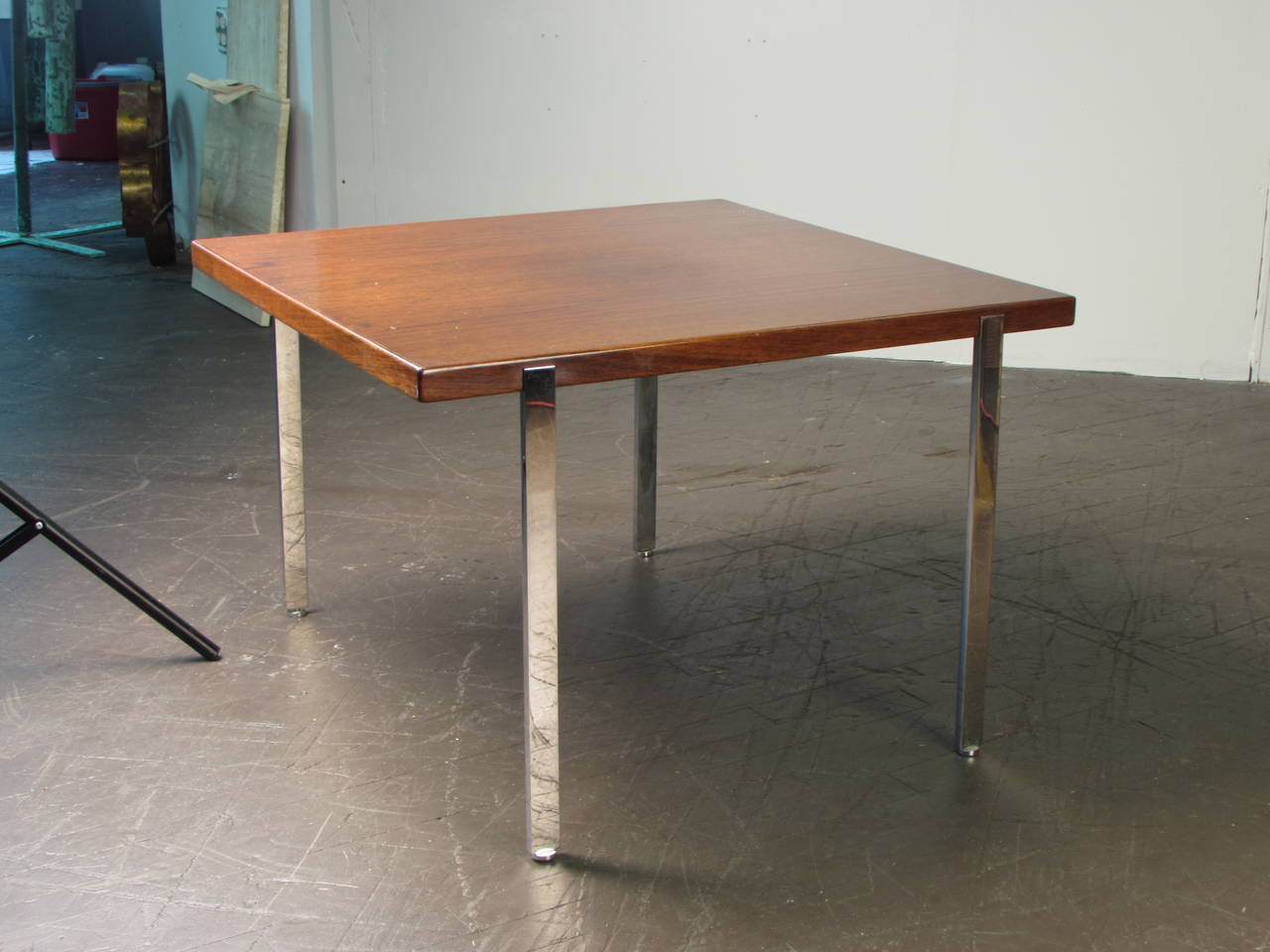 Simple Rosewood and Chrome Side Table by Harvey Probber, 1960s. Excellent vintage condition. Originally part of the living room suite and sat at the end of the sofa, which is also for sale.

We offer free regular deliveries to NYC and Philadelphia