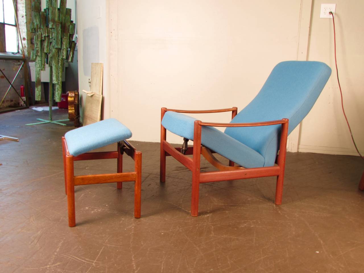 Handsome reclining lounge chair and ottoman by Westnofa, Norway, 1960s. This piece is extremely comfortable and in excellent condition. Newly reupholstered. Teak frame has a gorgeous aged tone.

We offer free regular deliveries to NYC and