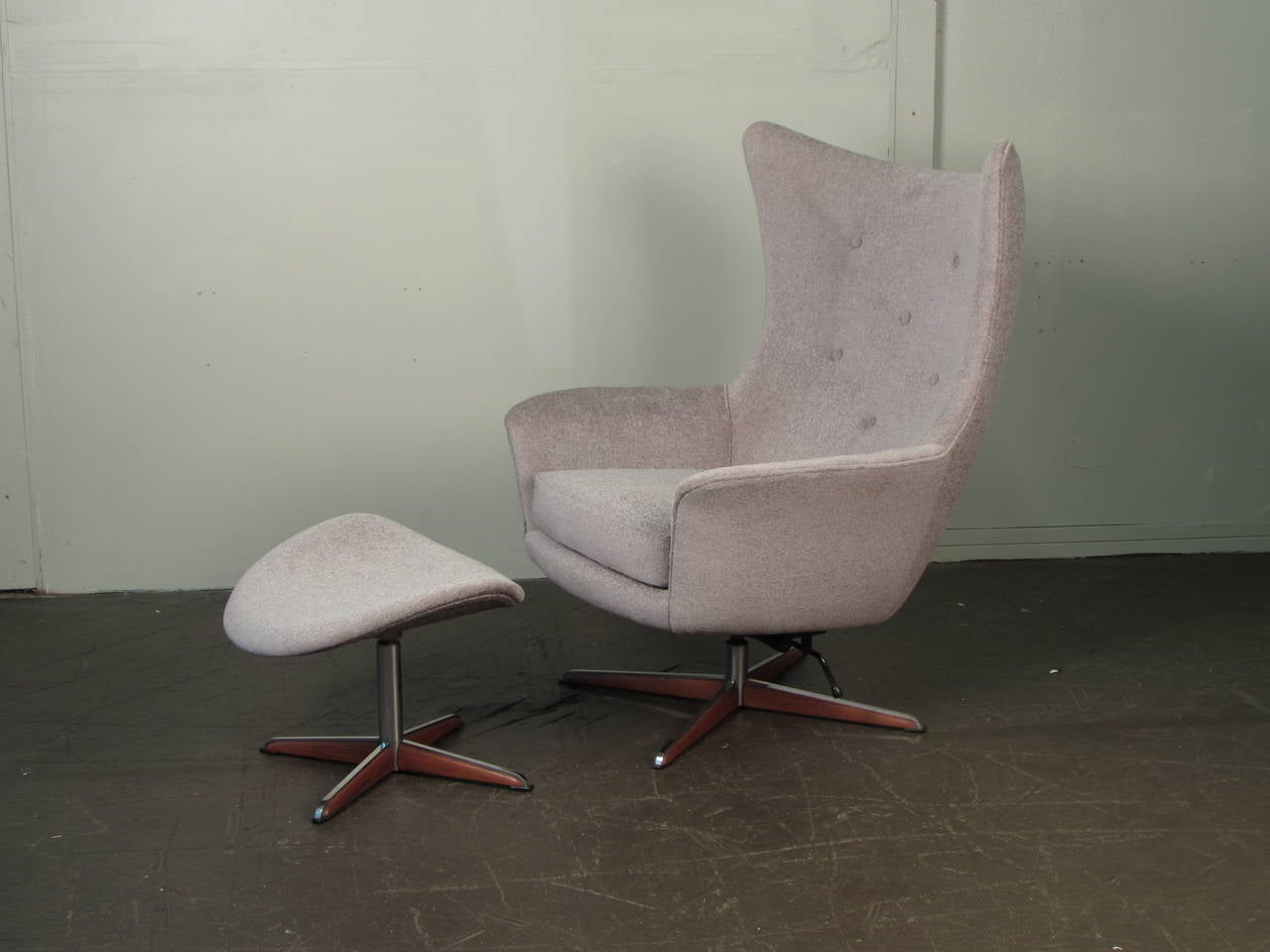 Rare sculptural lounge chair and ottoman by H.W. Klein for Bramin Mobler. Extremely comfortable. Great condition and ready for upholstery. Currently upholstery is in great condition and could be used as is but is separating from frame around the