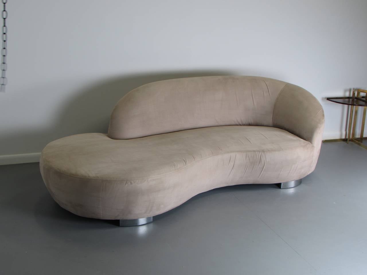 Fantastic serpentine cloud sofa by Vladimir Kagan for directional, 1970s. This piece is in original condition. Upholstery has significant wear. Structurally perfect and chrome bases are in great condition. Ready for your custom upholstery!