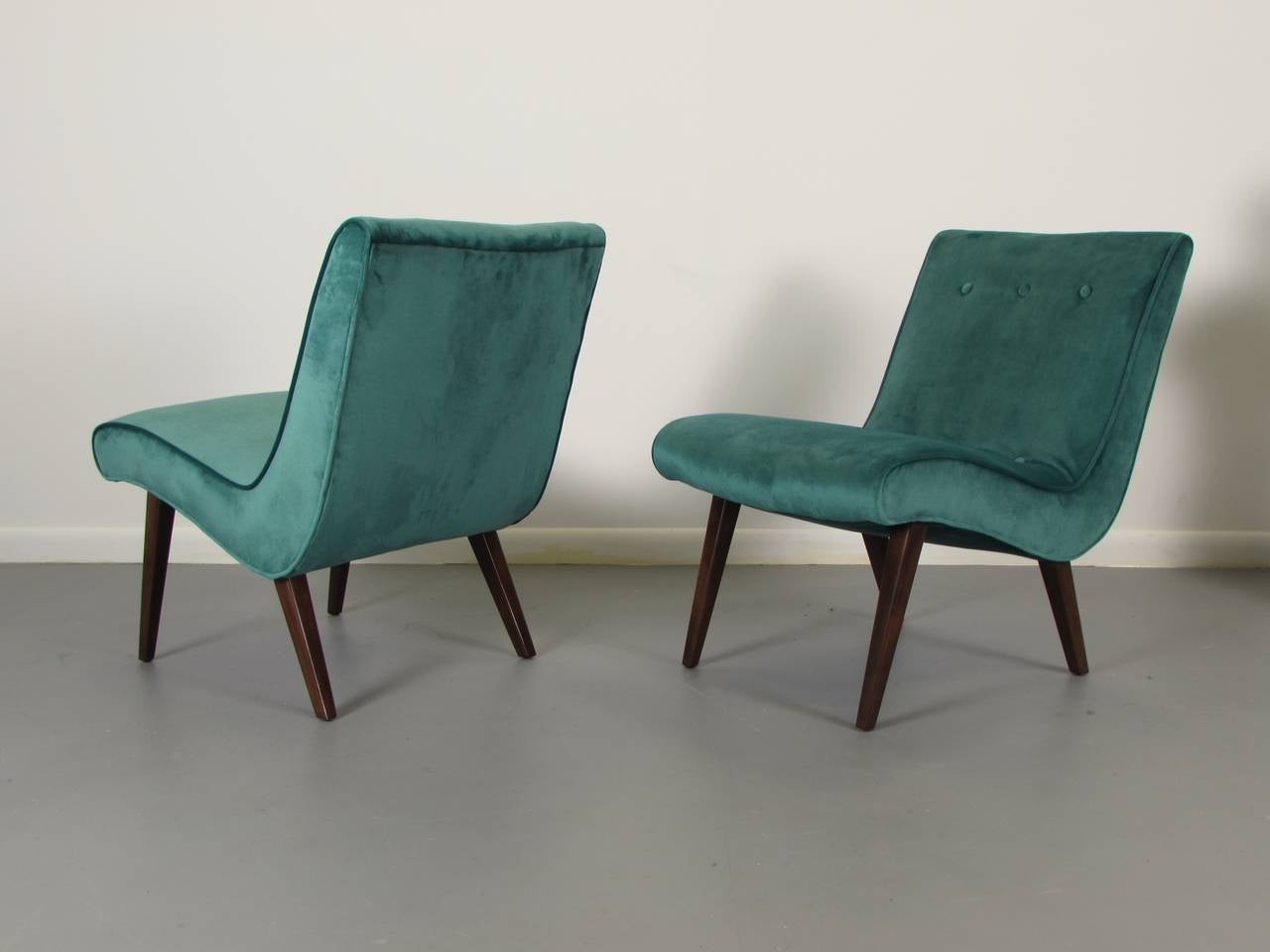 Sculptural scoop slipper chairs in velvet with walnut legs, 1950s. Simple and elegant as well as comfortable! These pieces have been fully restored.

We offer free regular deliveries to NYC and Philadelphia area. Delivery to DC, MD, CT and MA are