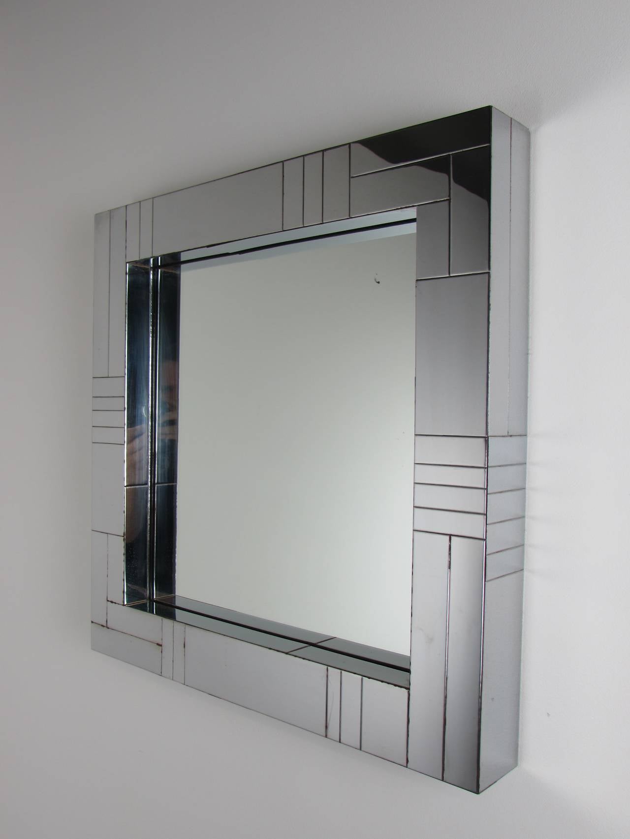 Chrome cityscape mirror by Paul Evans, signed,circa 1970.

See this item in our private NYC showroom! Refine Limited is located in the heart of Chelsea at the history Starrett-LeHigh Building, 601 West 26th Street, Suite M258. 11am-5pm, Mon-Fri.