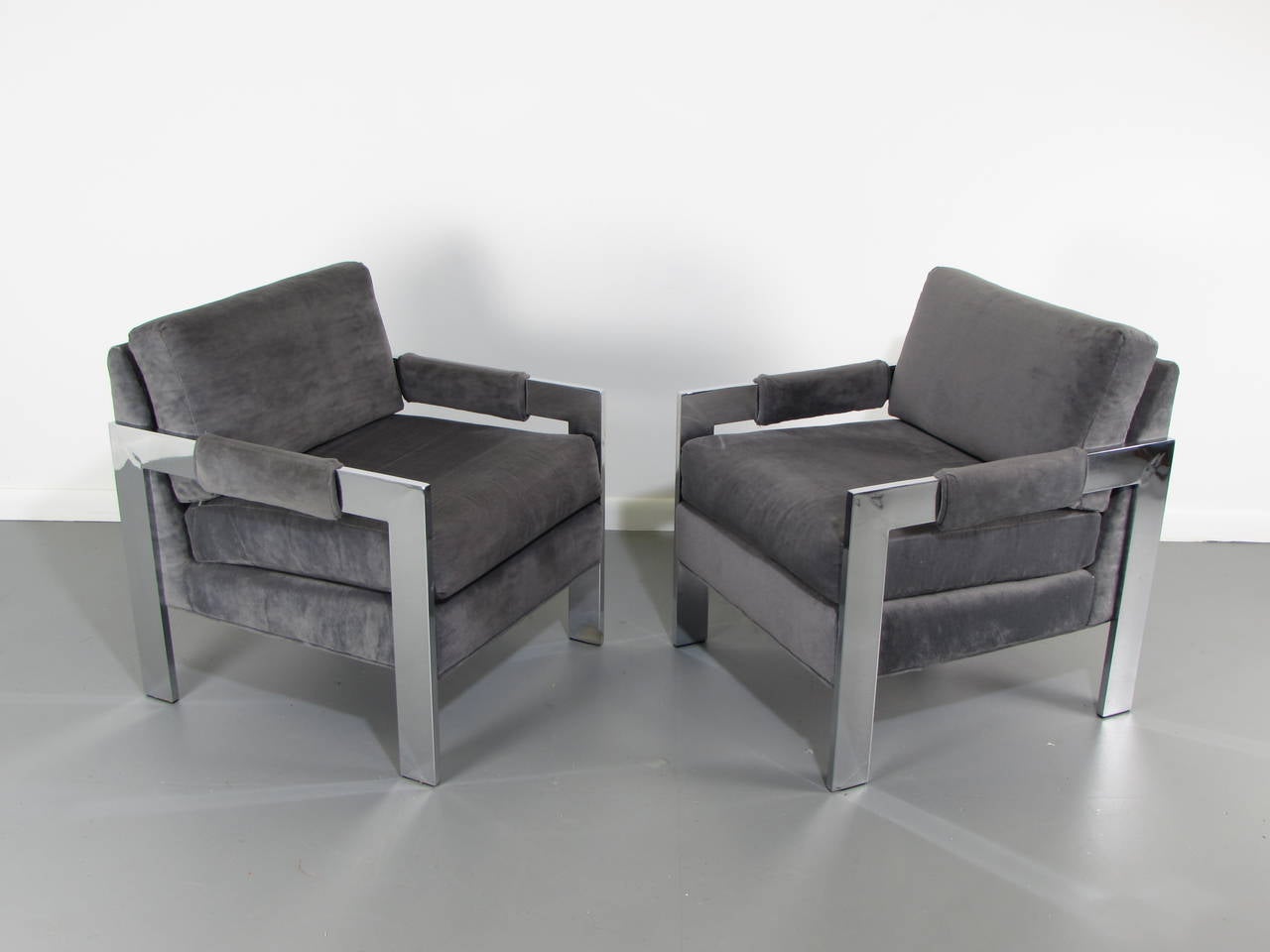 Pair of Glamorous Chunky Chrome 1970s Lounge Chairs. Stylish and comfortable with incredible chrome detail. Upholstery and chrome and in excellent vintage condition with normal wear. 

We offer free regular deliveries to NYC and Philadelphia area.