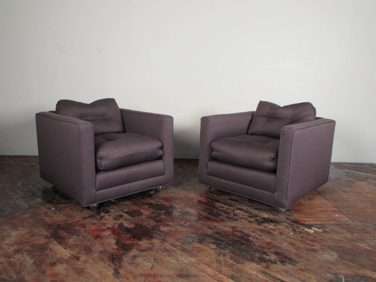 We offer personal white glove delivery to NYC!

Handsome pair of 1970s Henredon club chairs, freshly reupholstered in textured charcoal gray matelassé. Impeccable quality and Classic, timeless styling in a rich neutral. Seat and back cushions are