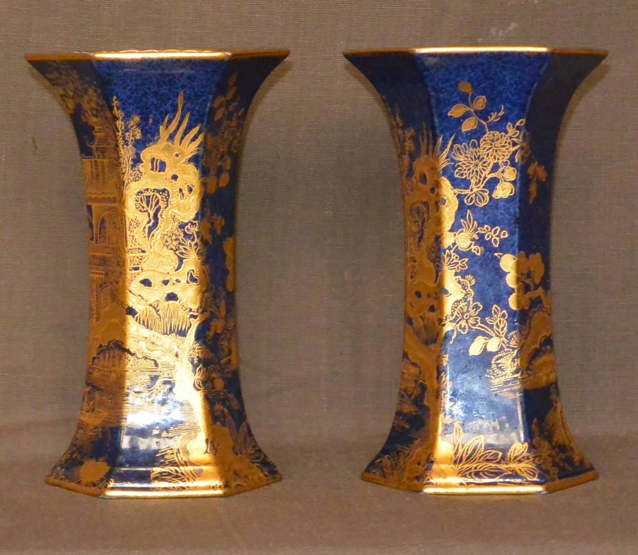 Pair hexagonal English Wilton Ware blue and gold vases, c.1923-34.  A.G. Harley Jones 1907-1934.
Dimension: 6.125