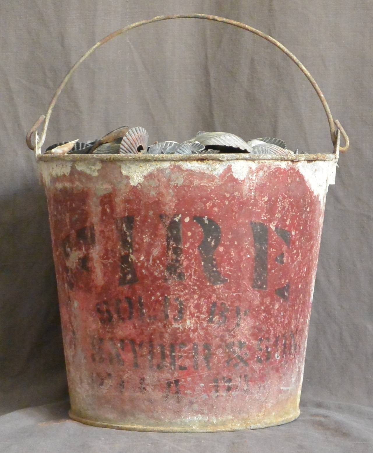 Pair antique painted metal fire buckets by M.L. Snyder and Sons Philadelphia. 
Dimension: 11