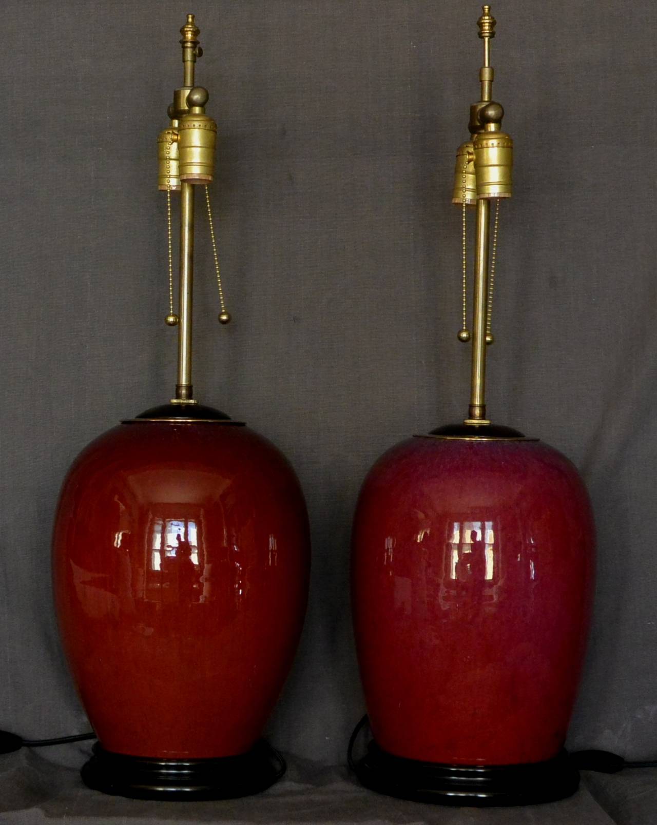Brass Pair of Red Chinese Flambe Sang De Boeuf Lamps
