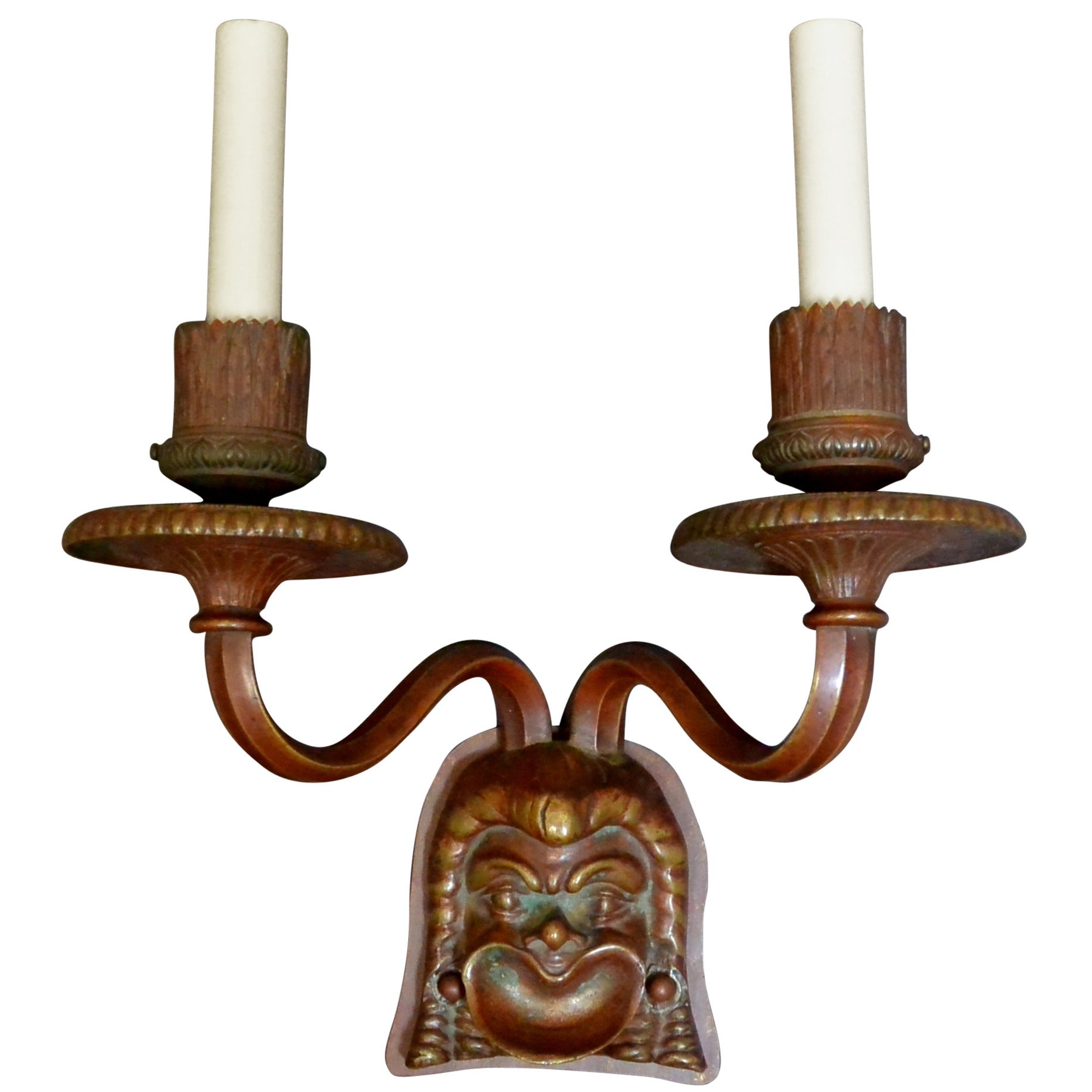 Scontrino con maschera etrusca