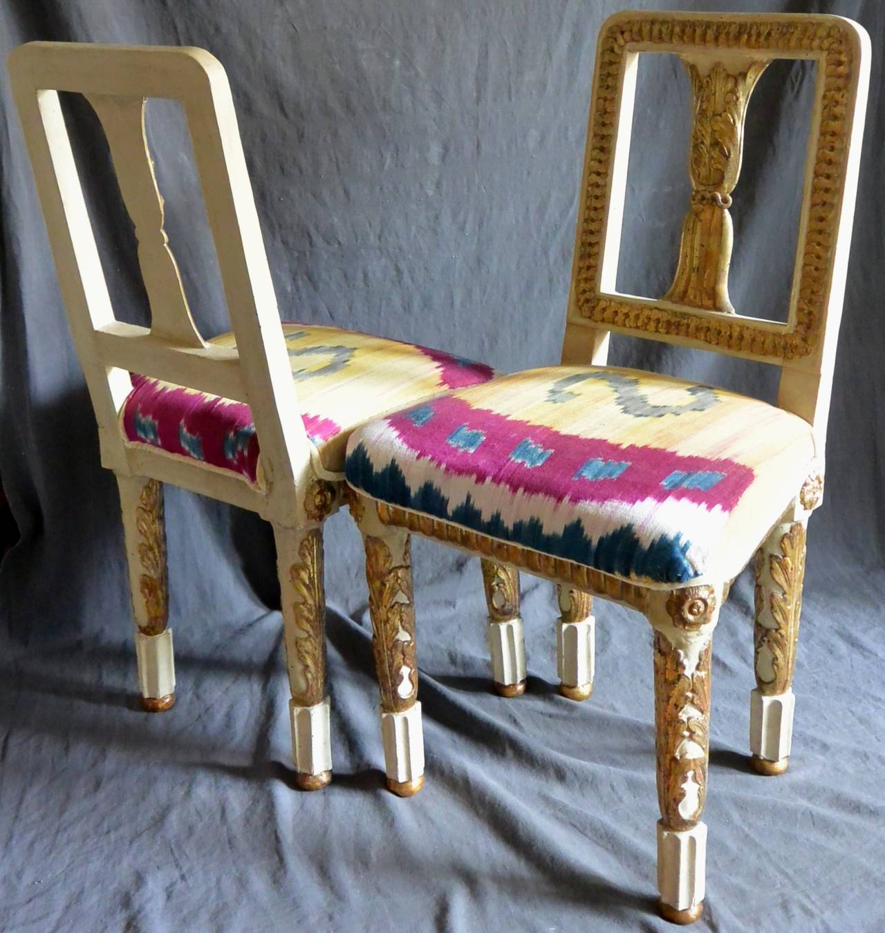 Pair of antique painted and giltwood Neapolitan hall chairs in original painted condition. Newly re-upholstered with silk velvet and applied antique silk Ikat. Painting and gilding newly re-freshed.
Dimension: 35.5