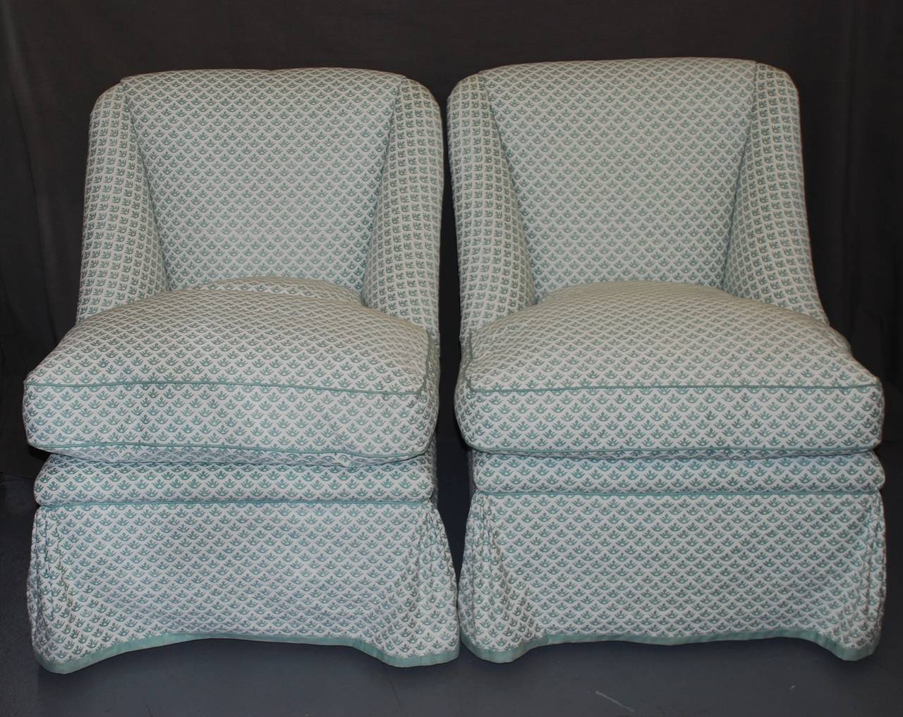 Pair of Fortuny cotton club chairs with down and feather seat cushion. 
Dimension: 30