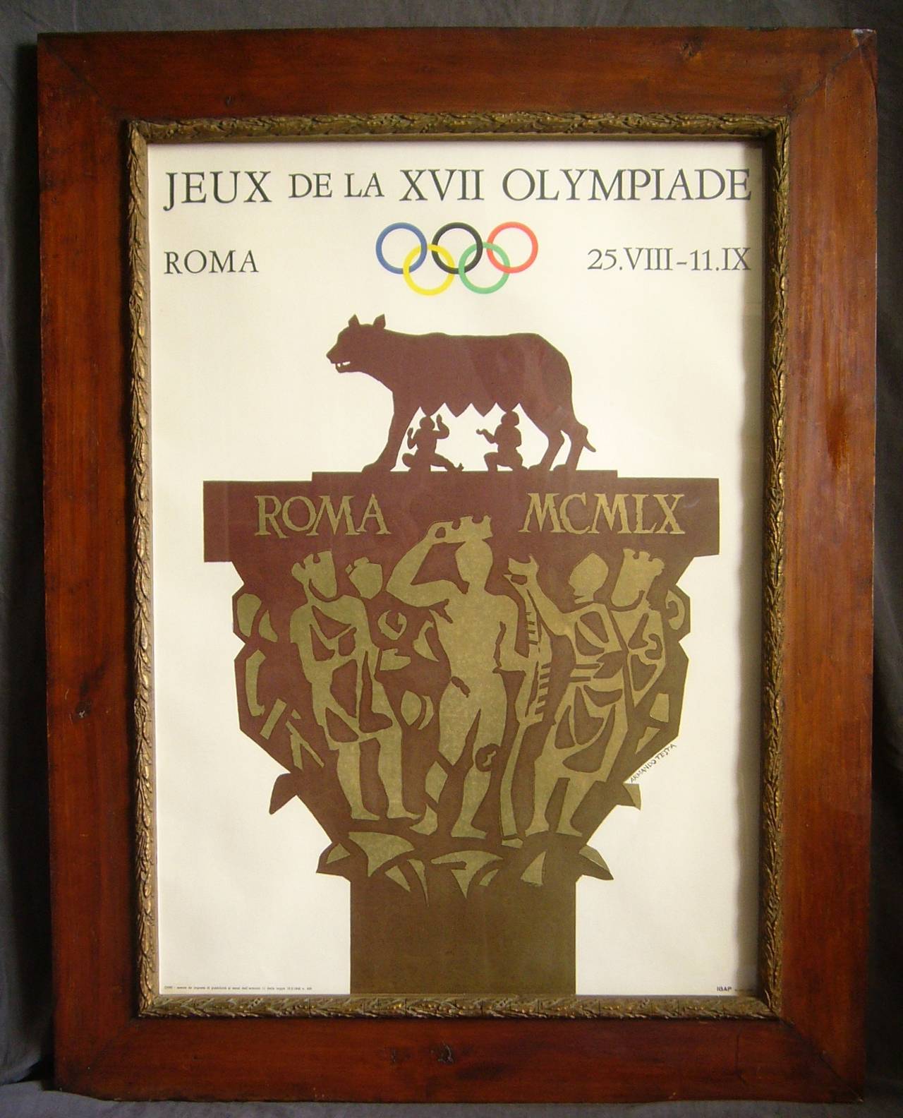 Original Rome Olympics Poster by Armando Testa, 1960.   Vintage sport poster by Armando Testa for the 1960 Rome Olympic Games ; XVII Olympiad original poster in vintage wood and gilt plaster laurel trimmed frame.  Poster in mint condition.  Italy,