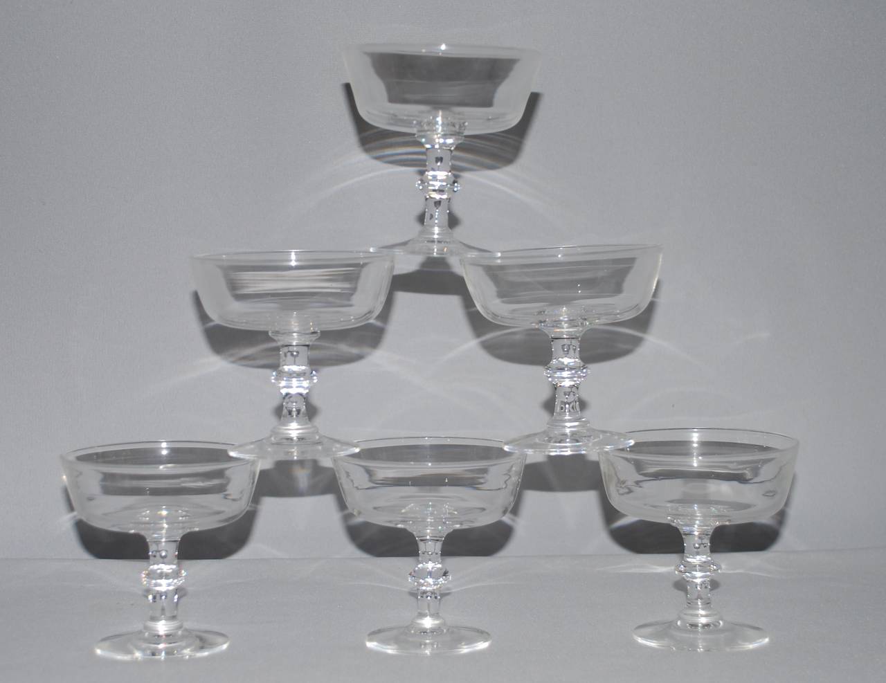 Six vintage Steuben champagne or sherbert coupes. Signed 