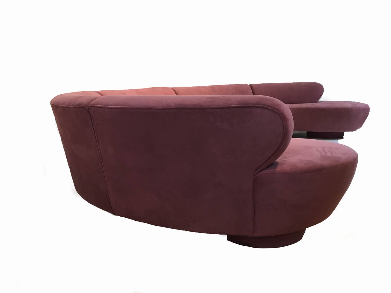 Exceptional five-piece serpentine cloud sofa. Fabric is mauve ultra suede and in excellent condition. Marvelous.