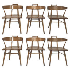 Unusual Wing Dining Chairs by the Northwest Co.