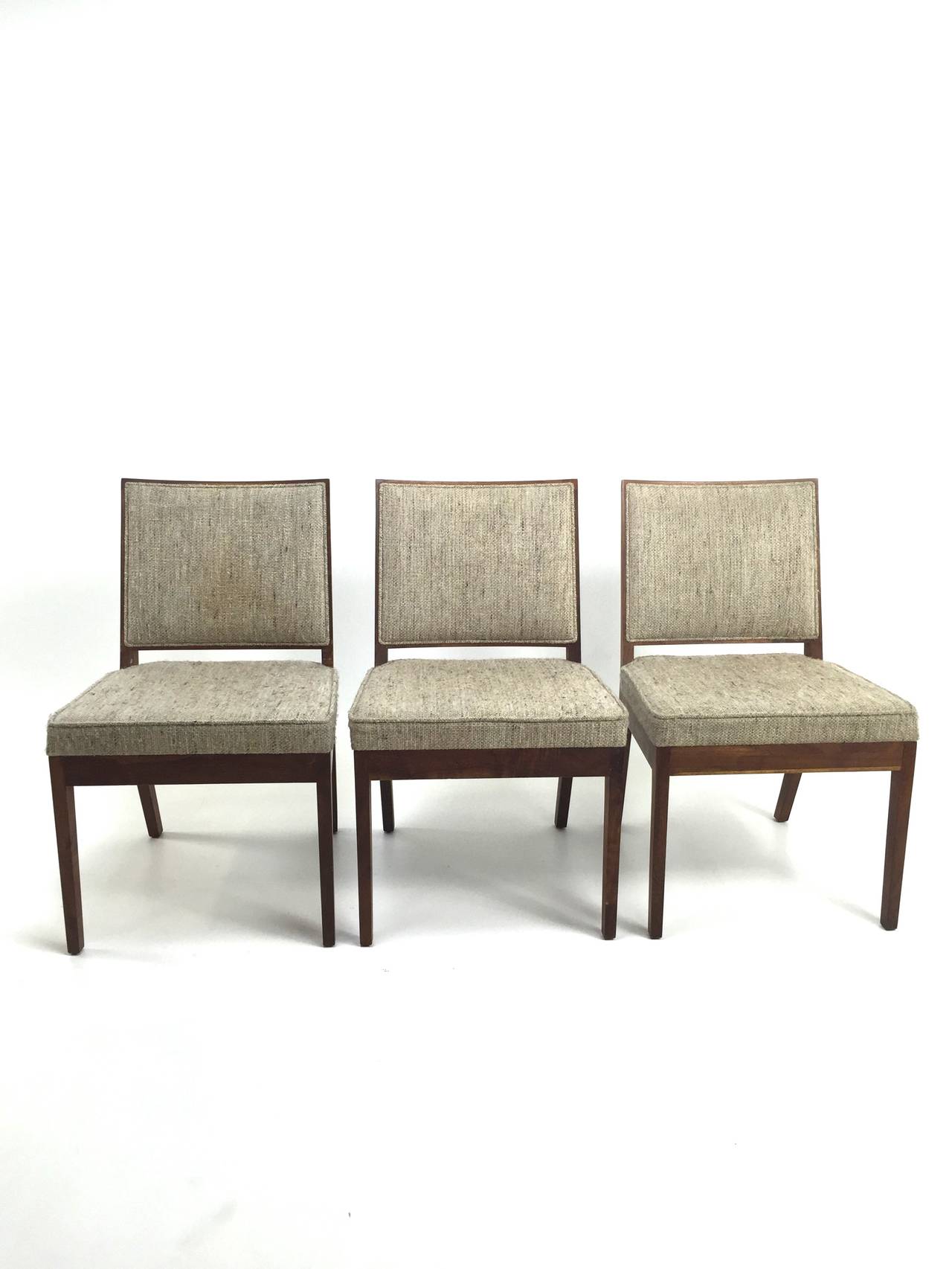 Set of six Glenn of California dining chairs by John Kapel. American Black Walnut with inset framed upholstered backs and box welted seats. Need recovering.