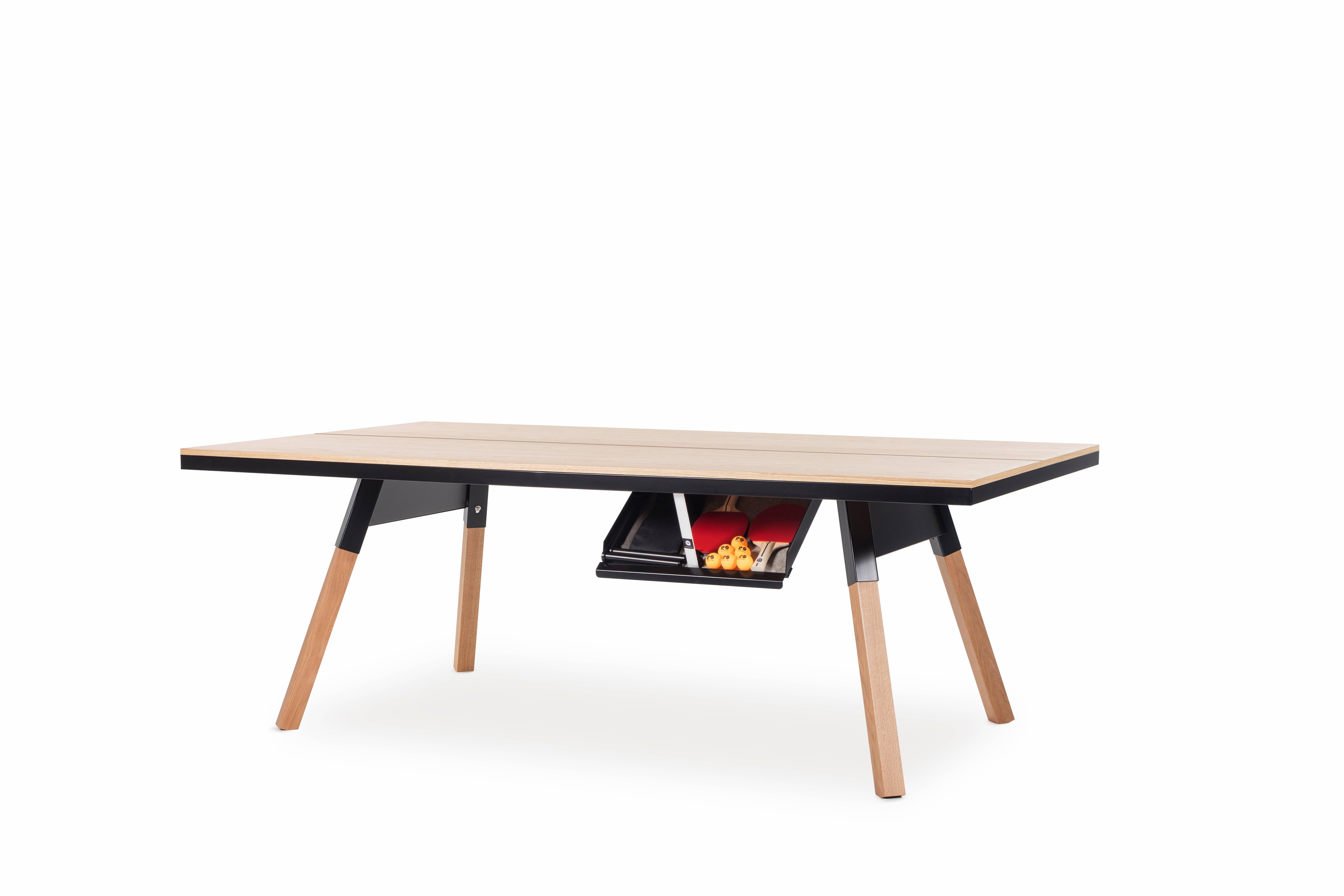 With our wood topped Medium You and Me ping-pong table, we’ve taken our playful attitude indoors. Wood offers comfort and elegance, while sportiness blends in seamlessly in new settings. There’s a place for everything with a You and Me. There’s a