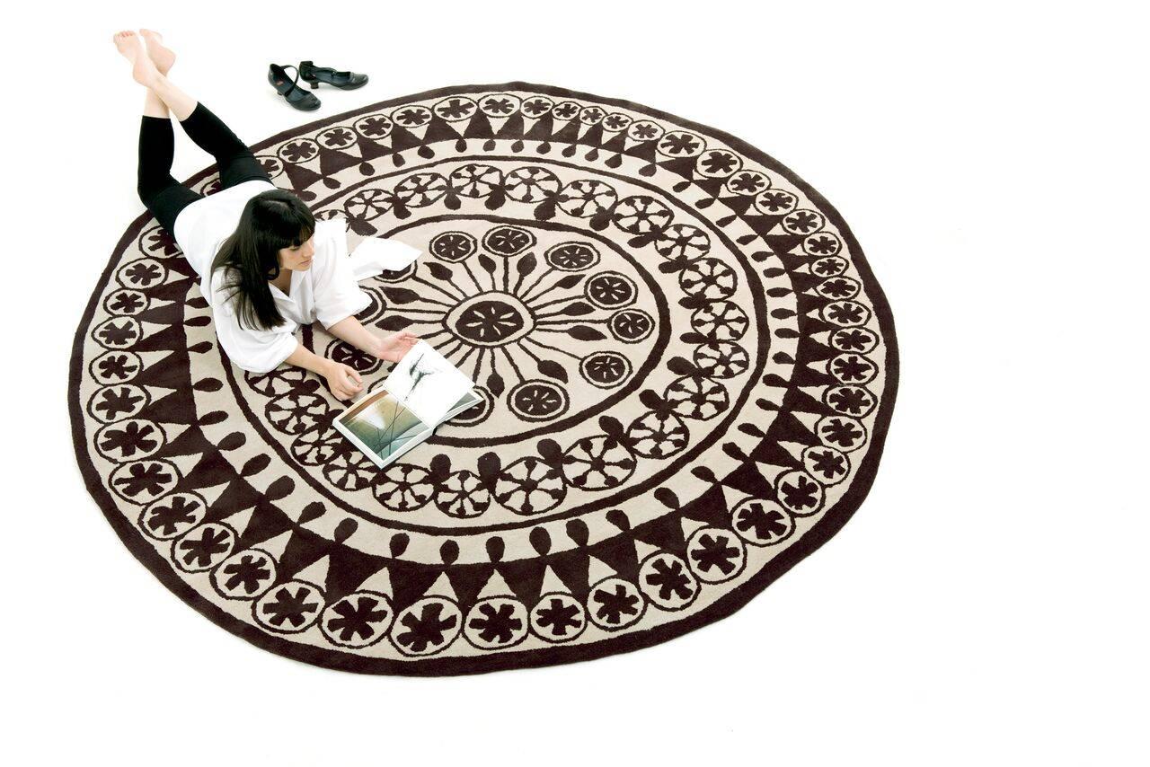 A Rangoli is a Hindu floral design with a long historic tradition. Placed on the floor at the entrance of houses or buildings as a welcome symbol, the Rangoli provides protection or offers good luck.

The pattern is normally composed of flower