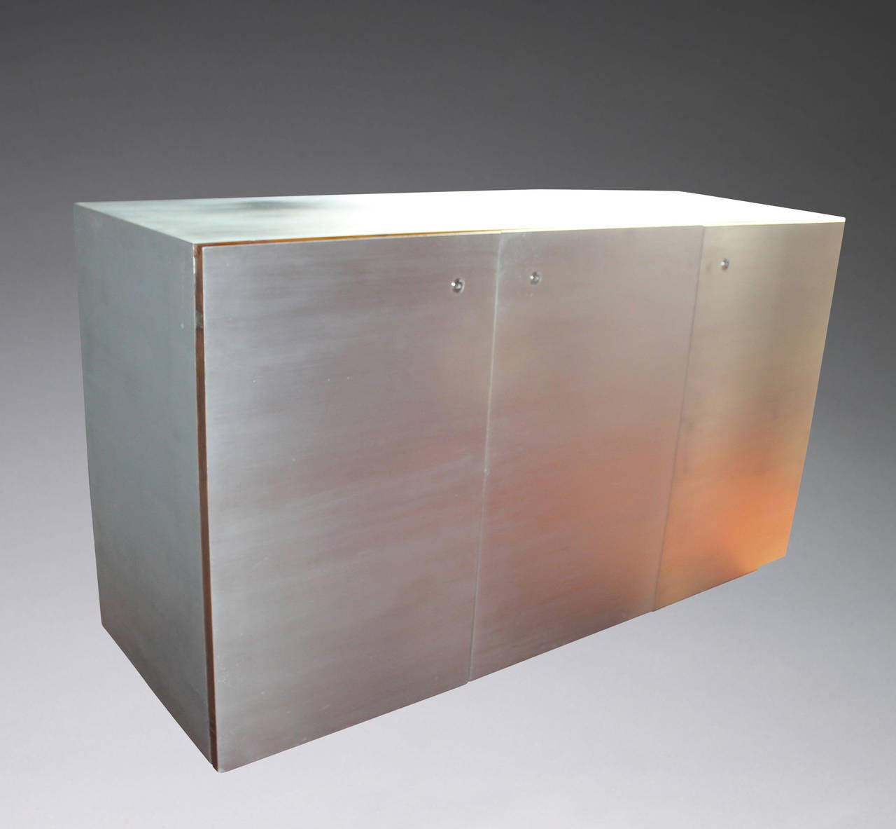 Michel Boyer.
Specially designed for the office of Baron de Rothschild, circa 1972 (Rothschild Bank, Paris).

Office cabinet in brushed steel with three doors. The central part has a built in mini-fridge or bar. Each door can be locked with a key