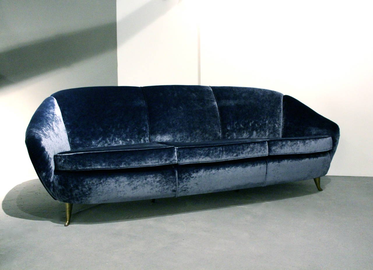 Elegant Sofa by Gio Ponti, Italy, 1950, for ISA, Bergame.Italy.

 Fully Restored

Blue Silk Velvet, renewed upholstery, cover, and Brass Foot
81 w x 34 d x 35 h inches

Worldwide shipping possibilities